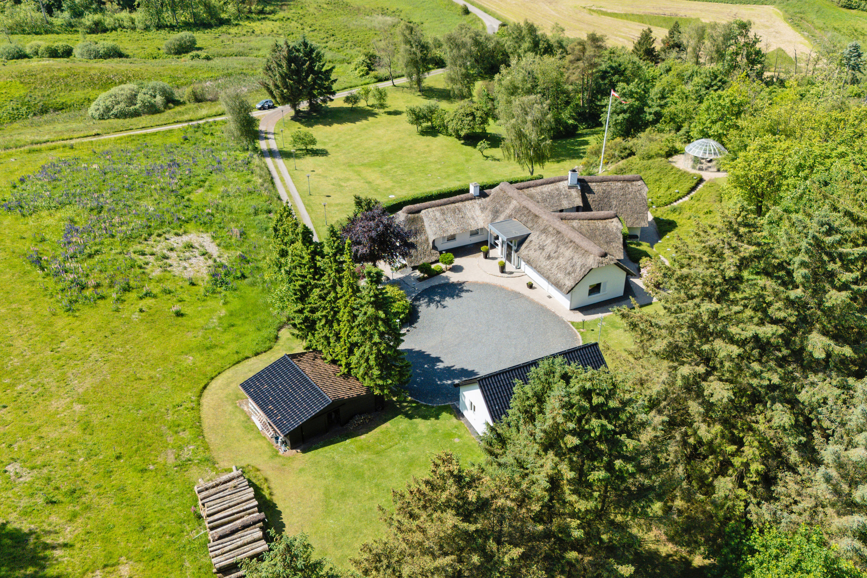 Fremhævet luftfoto billede i fuldskærmstilstand. Billede af Teglværksvej 60, Mygdal, 9800 Hjørring