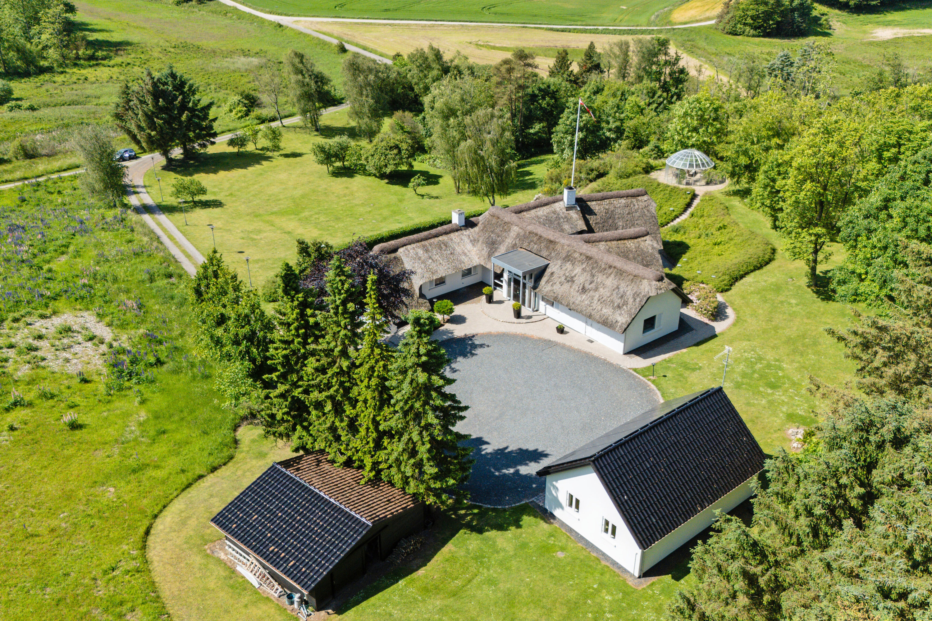 Fremhævet luftfoto billede i fuldskærmstilstand. Billede af Teglværksvej 60, Mygdal, 9800 Hjørring