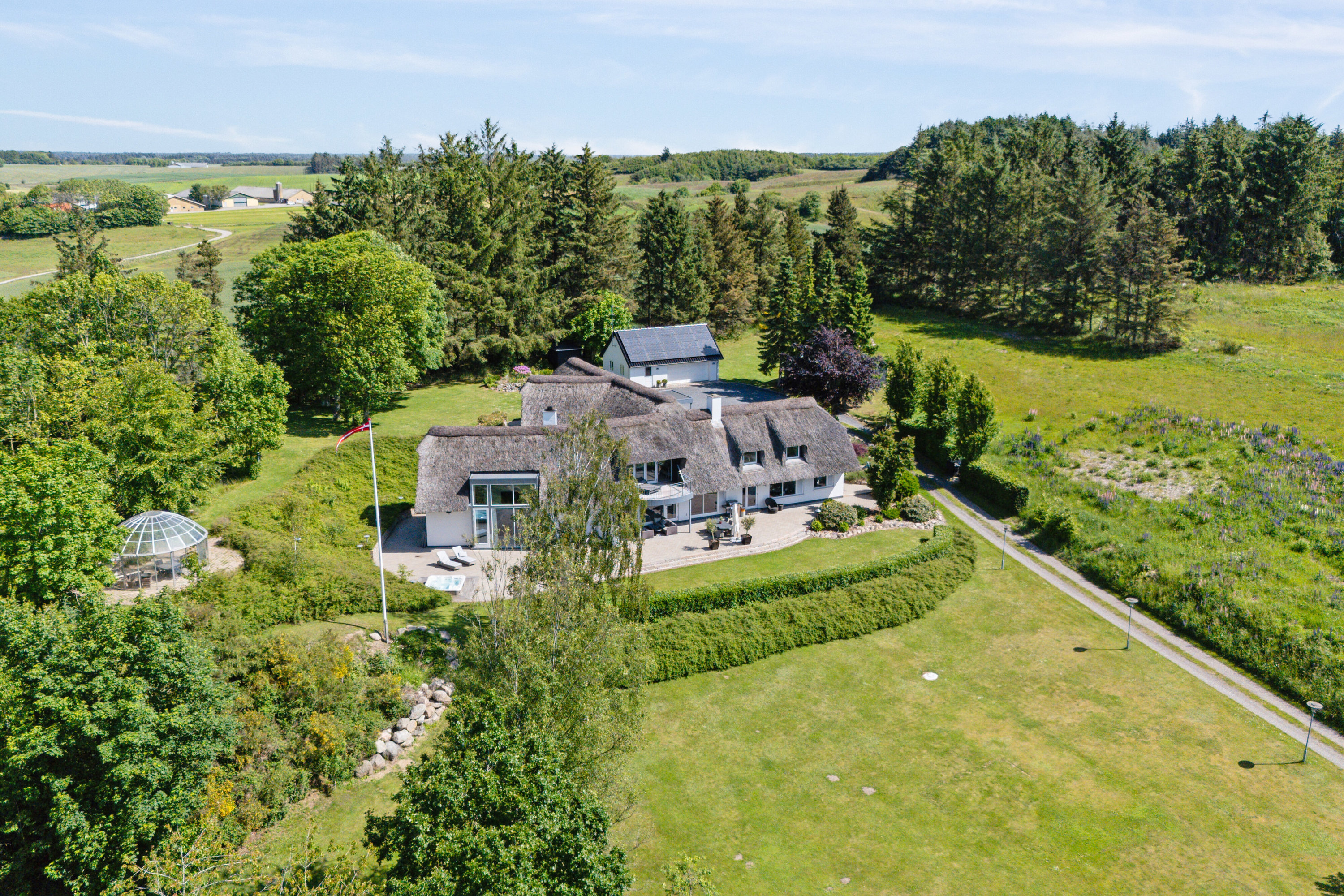 Fremhævet luftfoto billede i fuldskærmstilstand. Billede af Teglværksvej 60, Mygdal, 9800 Hjørring