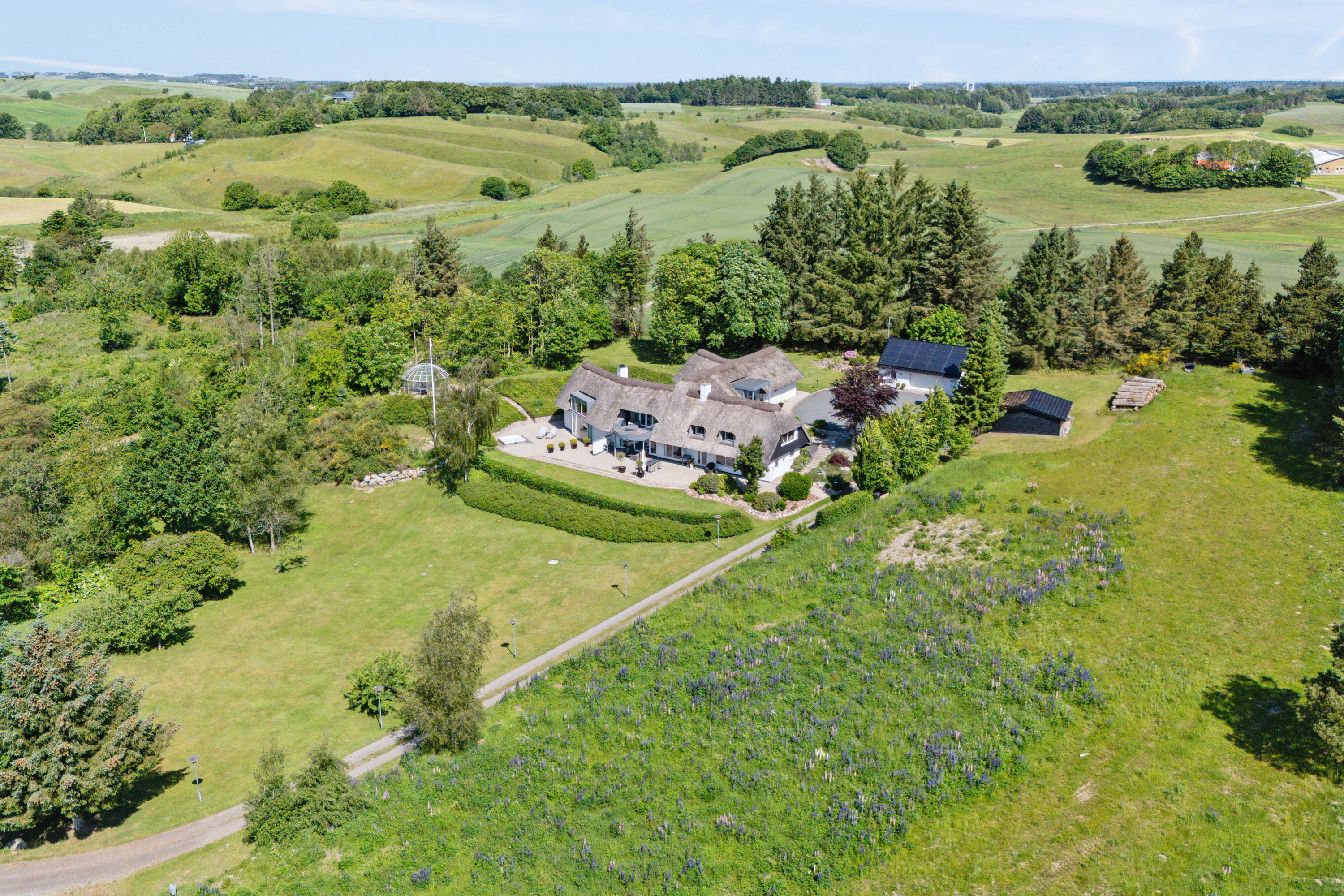 Fremhævet luftfoto billede i fuldskærmstilstand. Billede af Teglværksvej 60, Mygdal, 9800 Hjørring