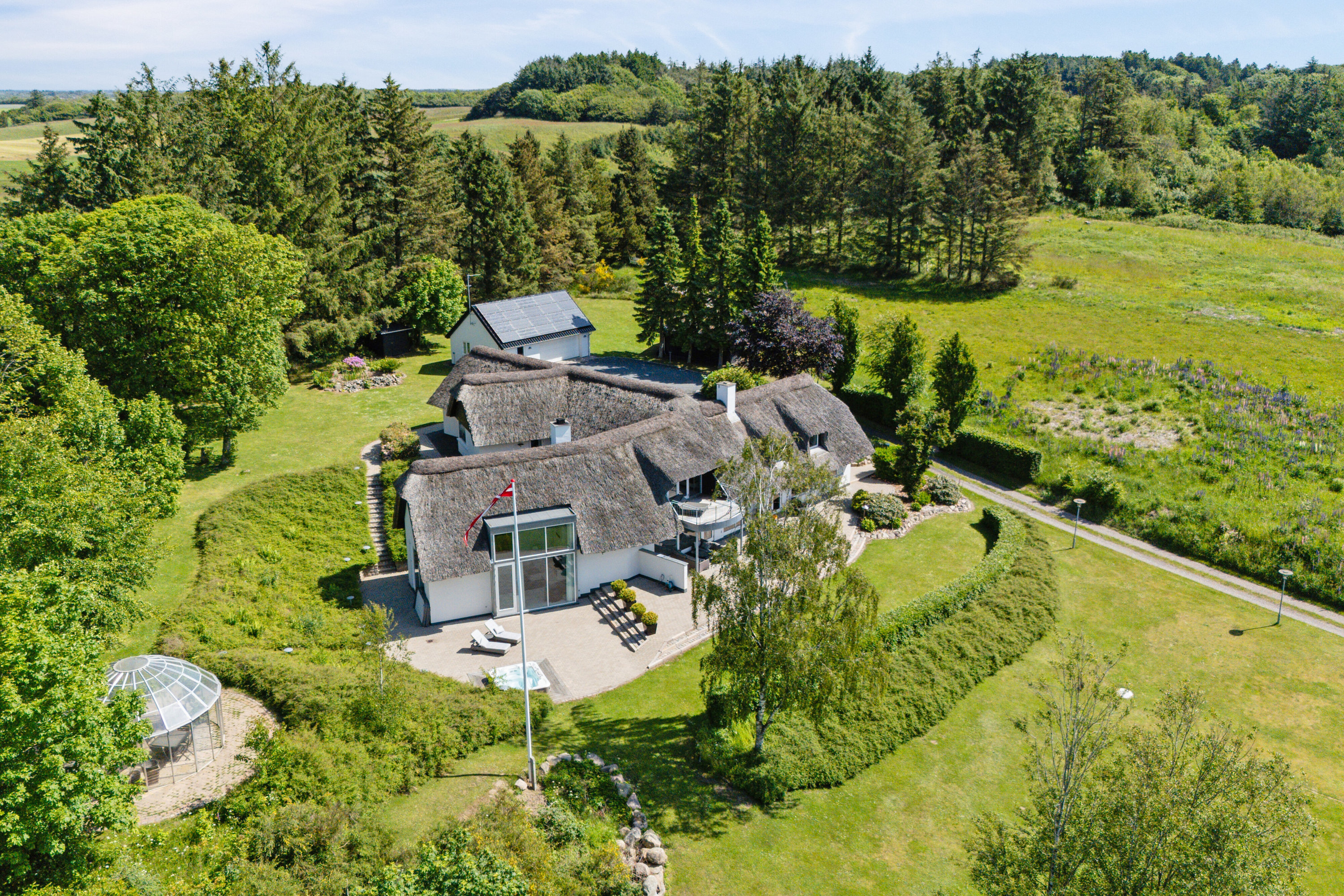 Fremhævet luftfoto billede i fuldskærmstilstand. Billede af Teglværksvej 60, Mygdal, 9800 Hjørring