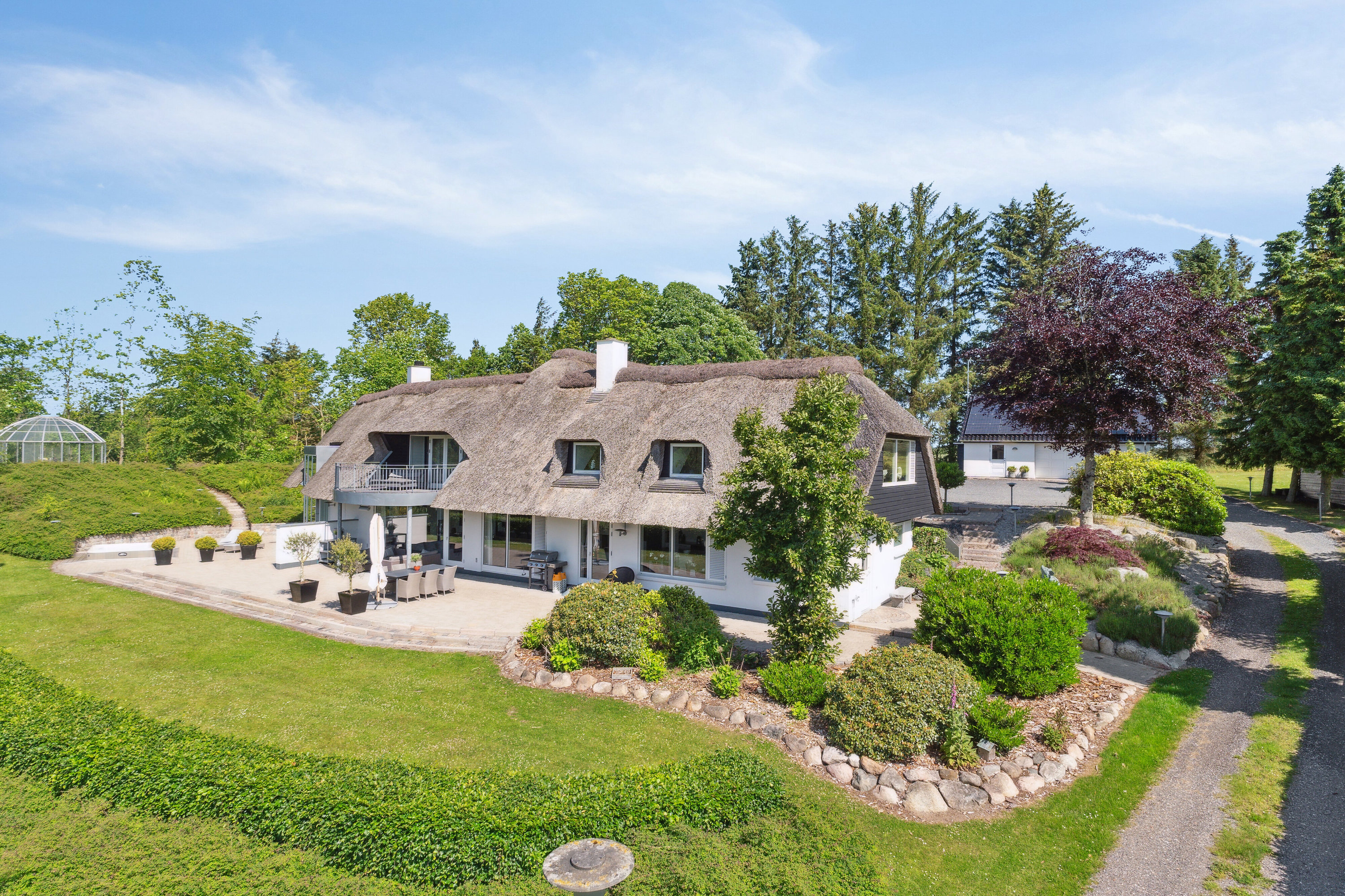 Fremhævet set fra haven billede i fuldskærmstilstand. Billede af Teglværksvej 60, Mygdal, 9800 Hjørring