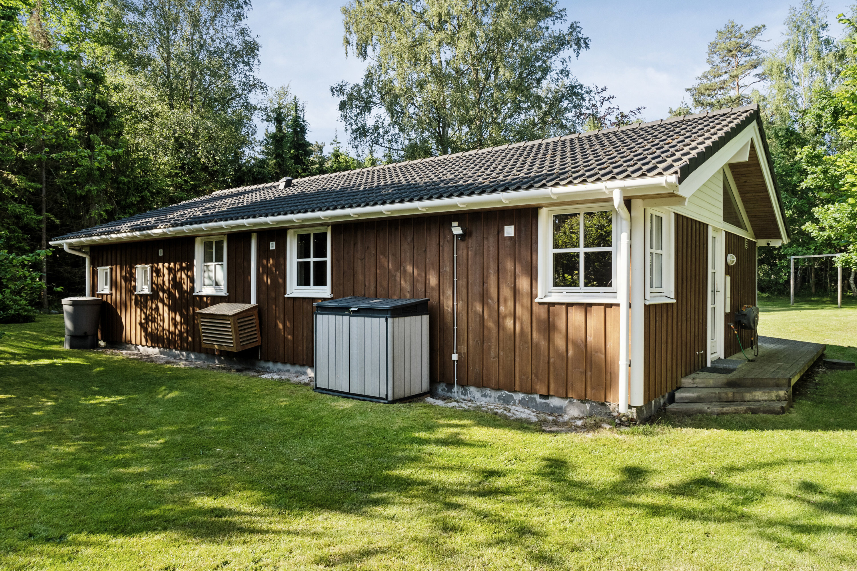 Fremhævet set fra haven billede i fuldskærmstilstand. Billede af Skovgyden 3, Gudmindrup Lyng, 4573 Højby