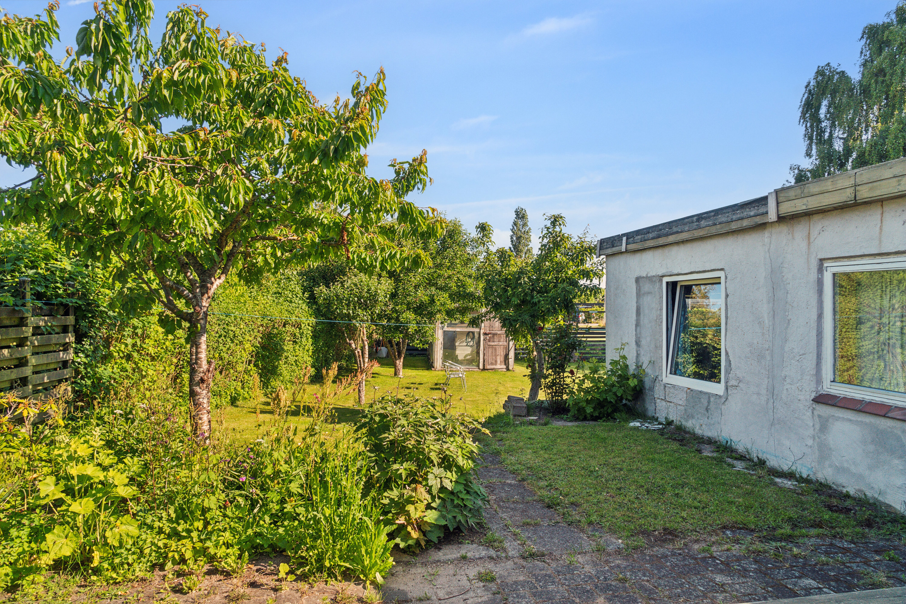 Fremhævet set fra haven billede i fuldskærmstilstand. Billede af Pilegårdsvej 12, Skovsø, 4200 Slagelse