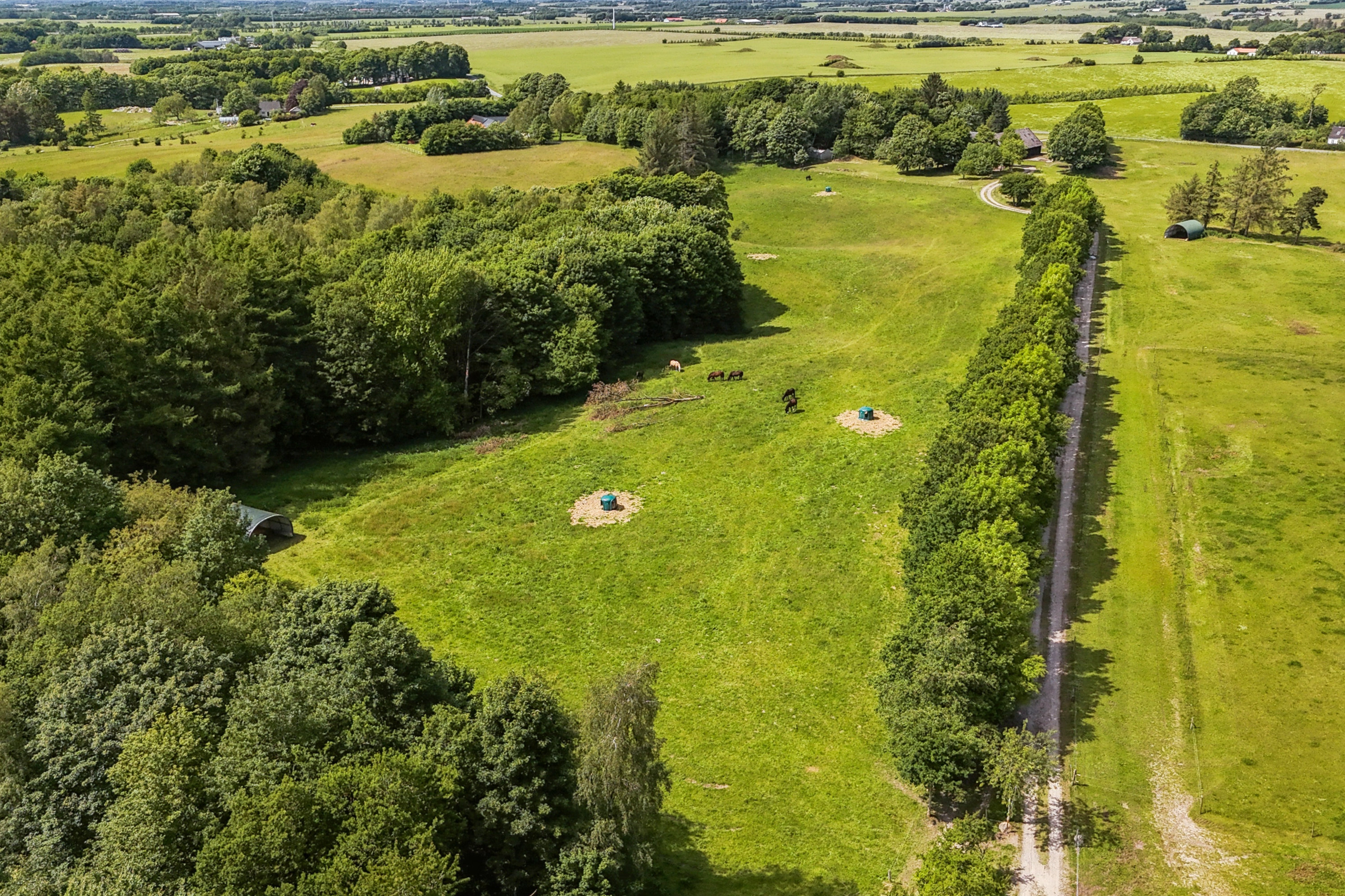 Fremhævet luftfoto billede i fuldskærmstilstand. Billede af Skovbovej 52, Krogen, 9500 Hobro