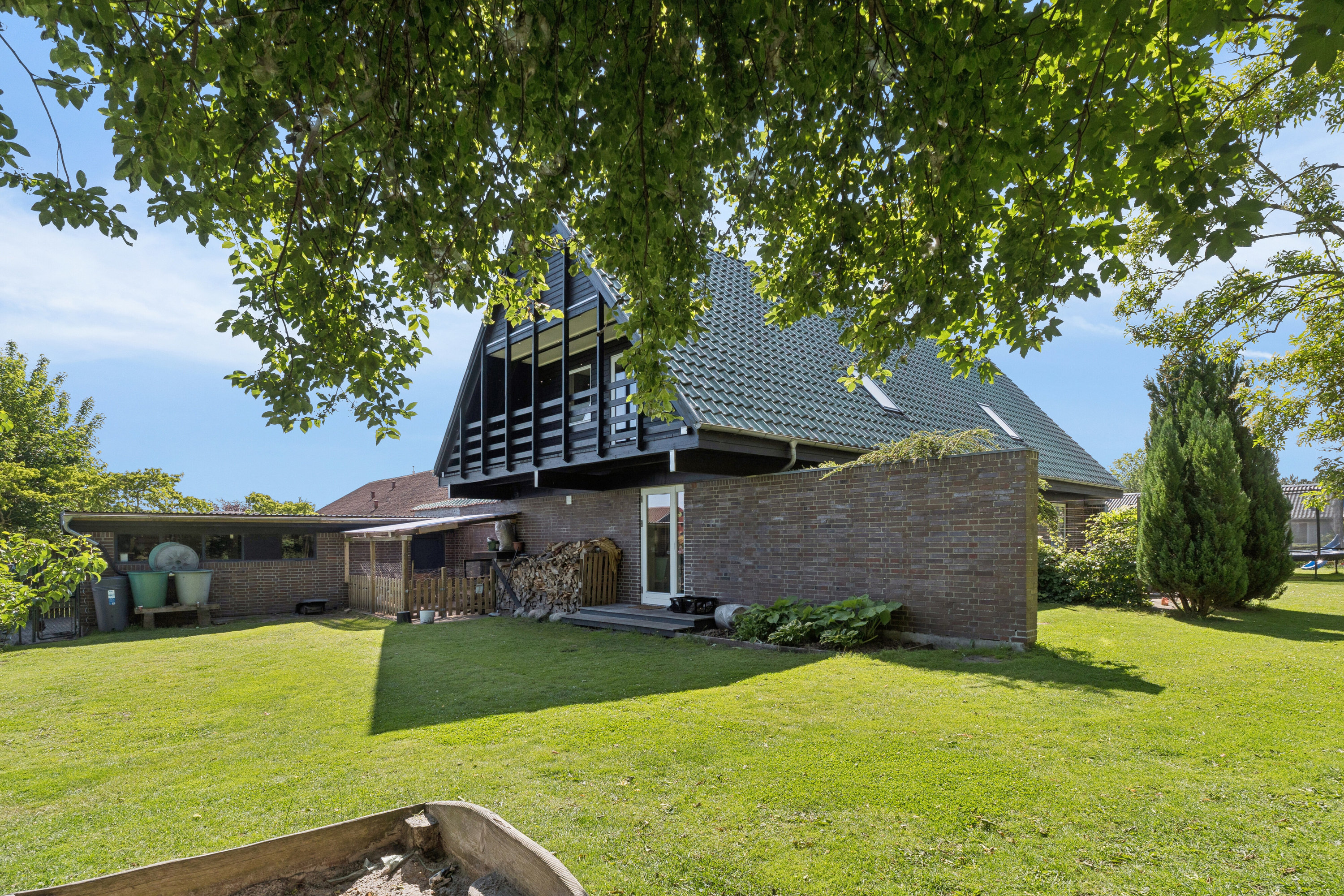 Fremhævet set fra haven billede i fuldskærmstilstand. Billede af Stærevej 6, 9881 Bindslev