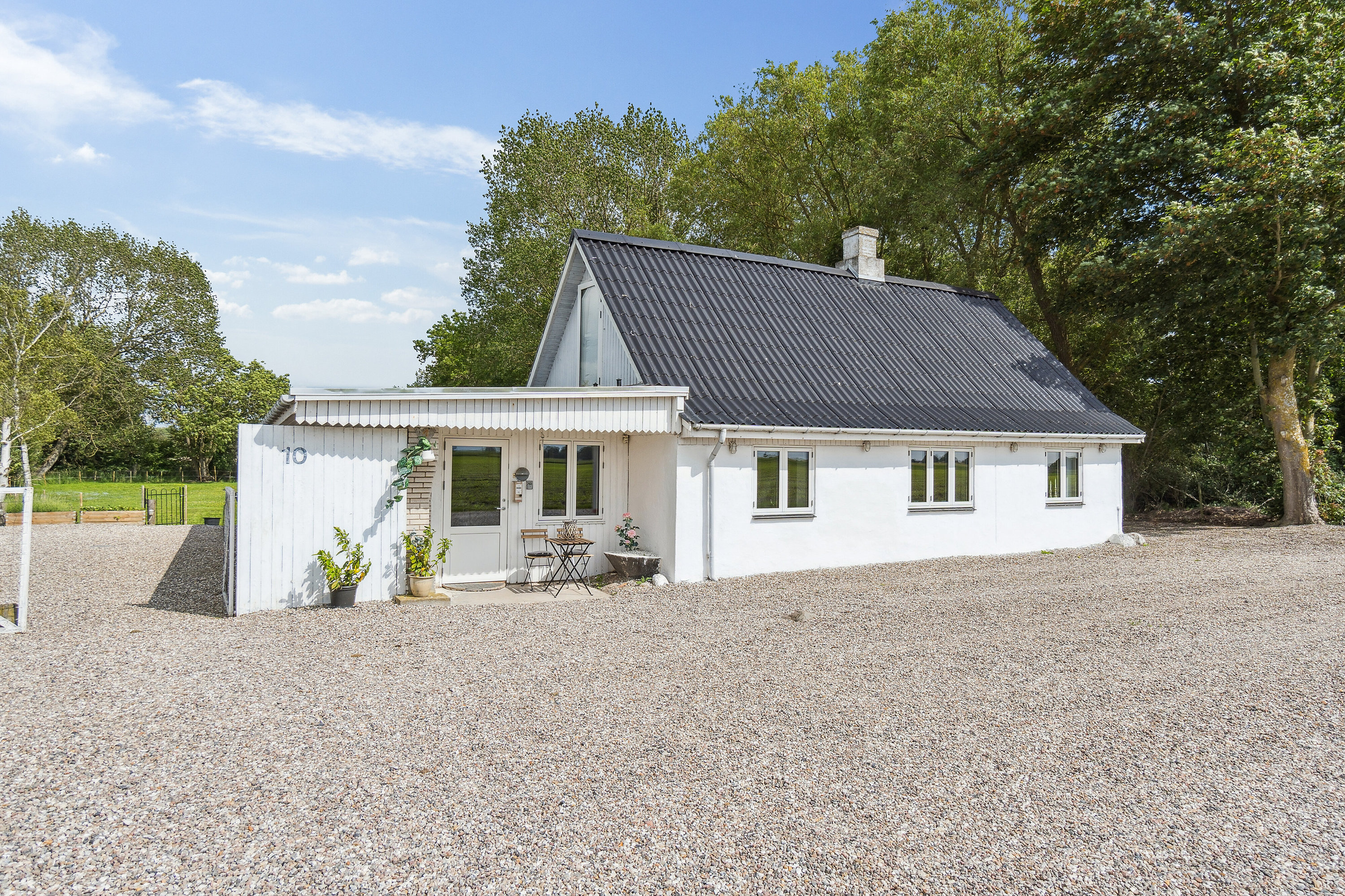 Fremhævet set fra haven billede i fuldskærmstilstand. Billede af Lodagervej 10, Hejninge, 4200 Slagelse