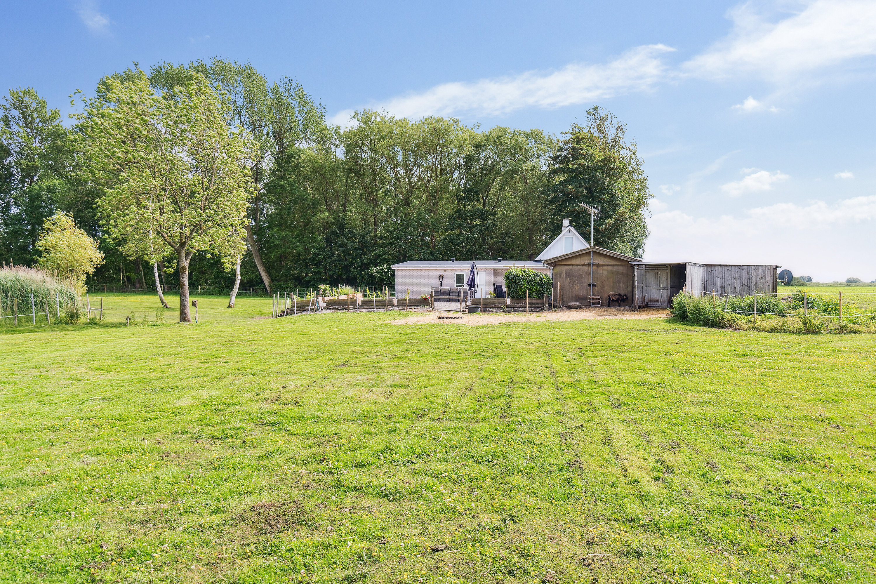 Fremhævet set fra haven billede i fuldskærmstilstand. Billede af Lodagervej 10, Hejninge, 4200 Slagelse