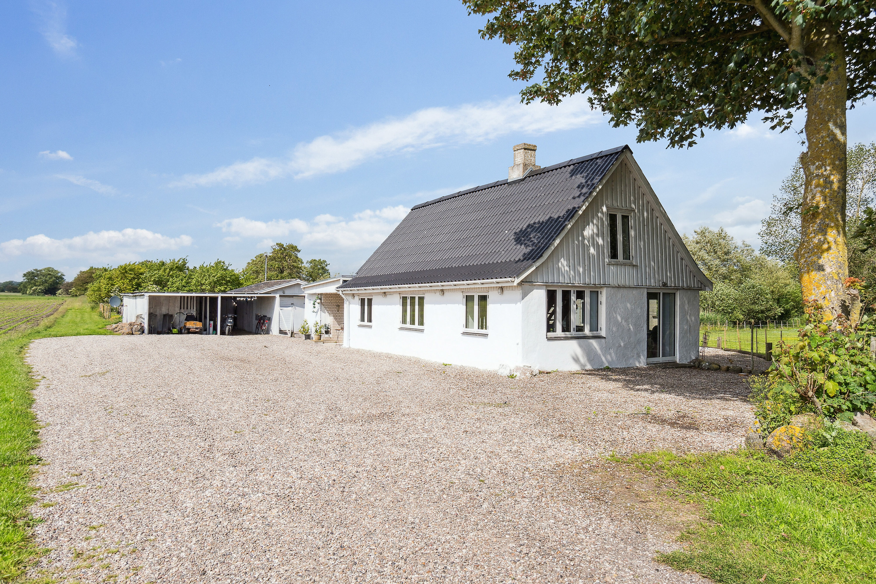 Fremhævet set fra haven billede i fuldskærmstilstand. Billede af Lodagervej 10, Hejninge, 4200 Slagelse