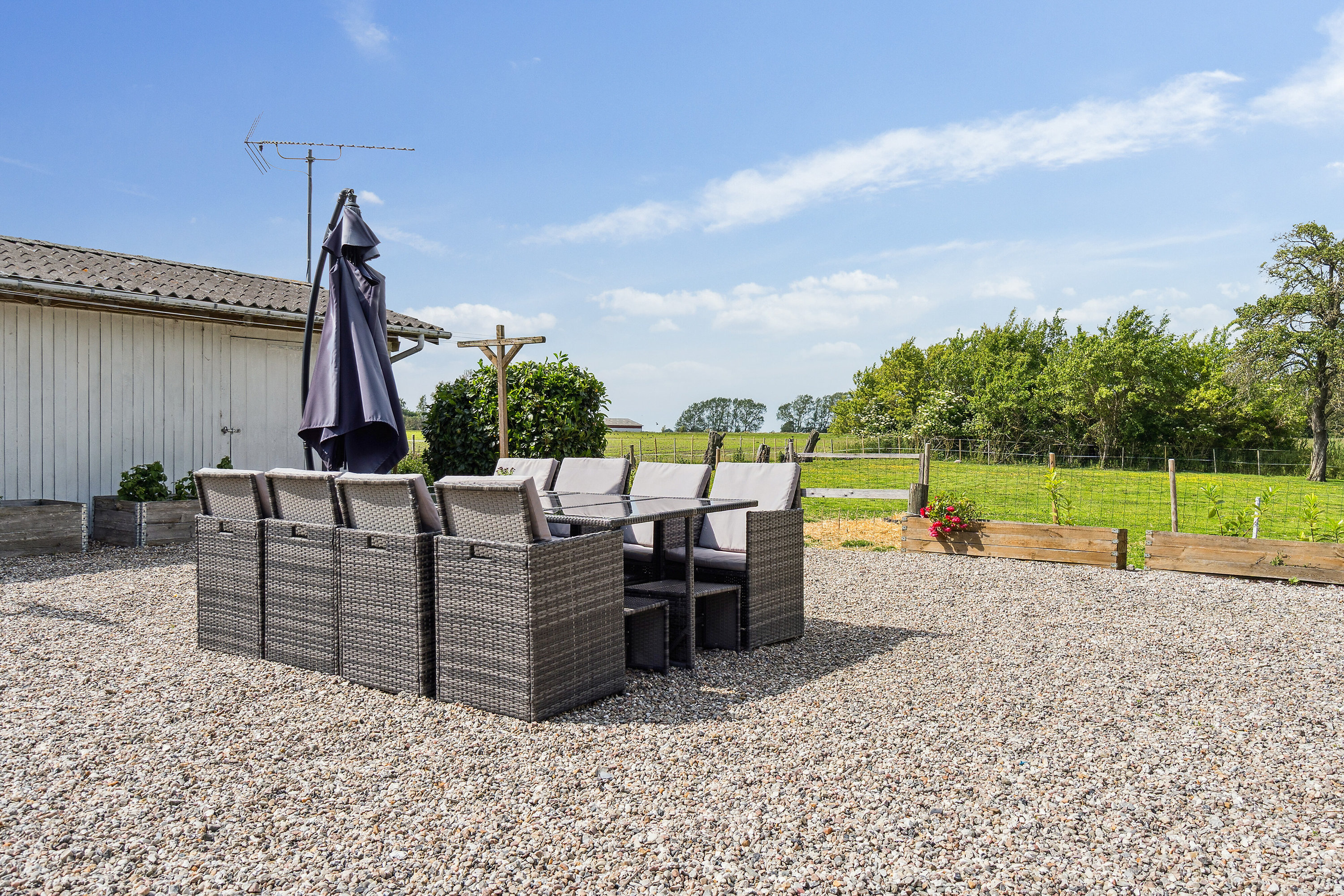 Fremhævet set fra haven billede i fuldskærmstilstand. Billede af Lodagervej 10, Hejninge, 4200 Slagelse