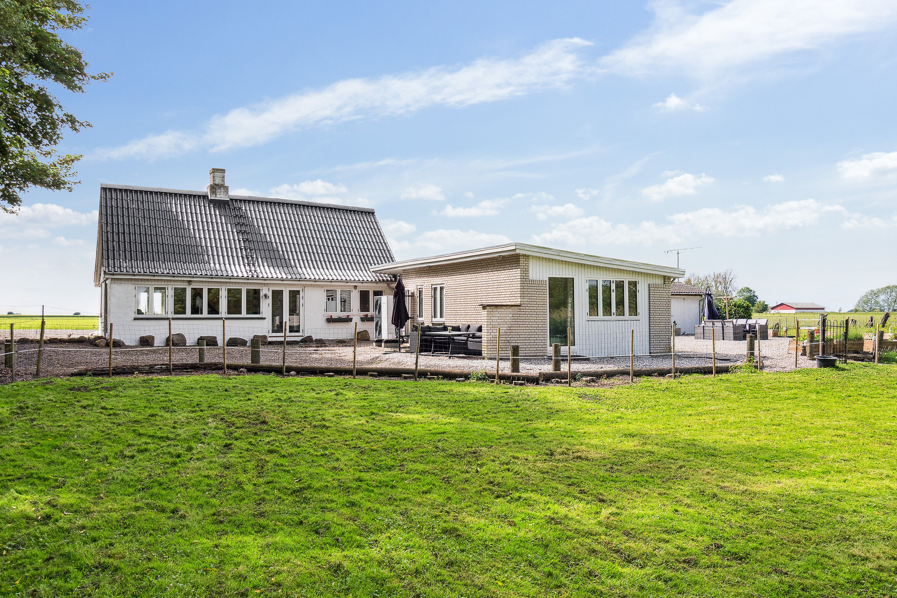 Fremhævet set fra haven billede i fuldskærmstilstand. Billede af Lodagervej 10, Hejninge, 4200 Slagelse