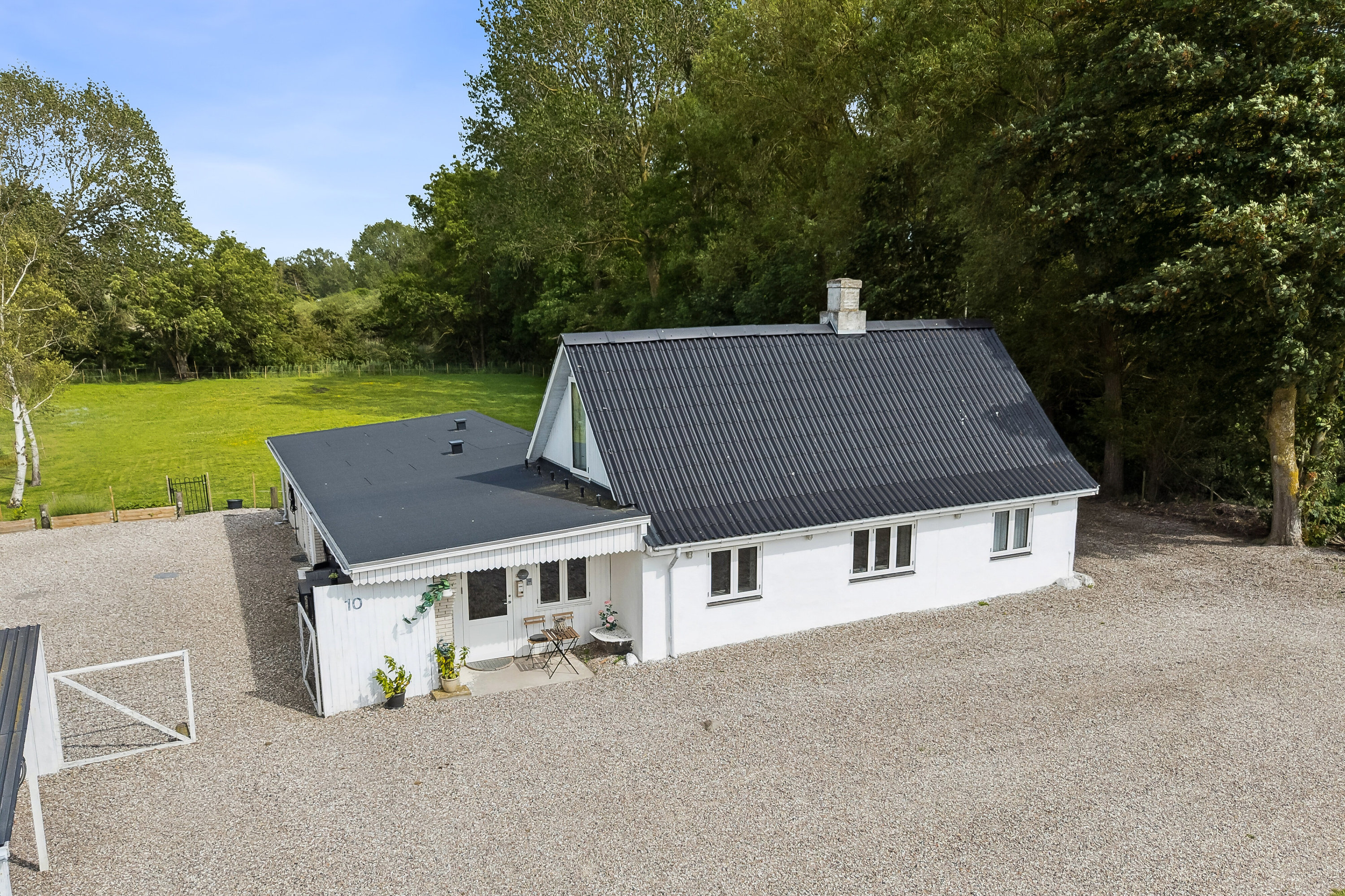 Fremhævet set fra haven billede i fuldskærmstilstand. Billede af Lodagervej 10, Hejninge, 4200 Slagelse