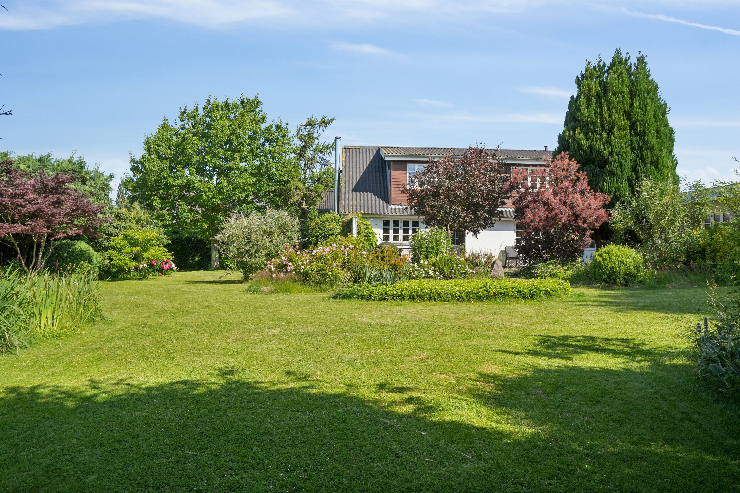 Fremhævet set fra haven billede i fuldskærmstilstand. Billede af Fjællebrovejen 35, Fjællebroen, 5762 Vester Skerninge