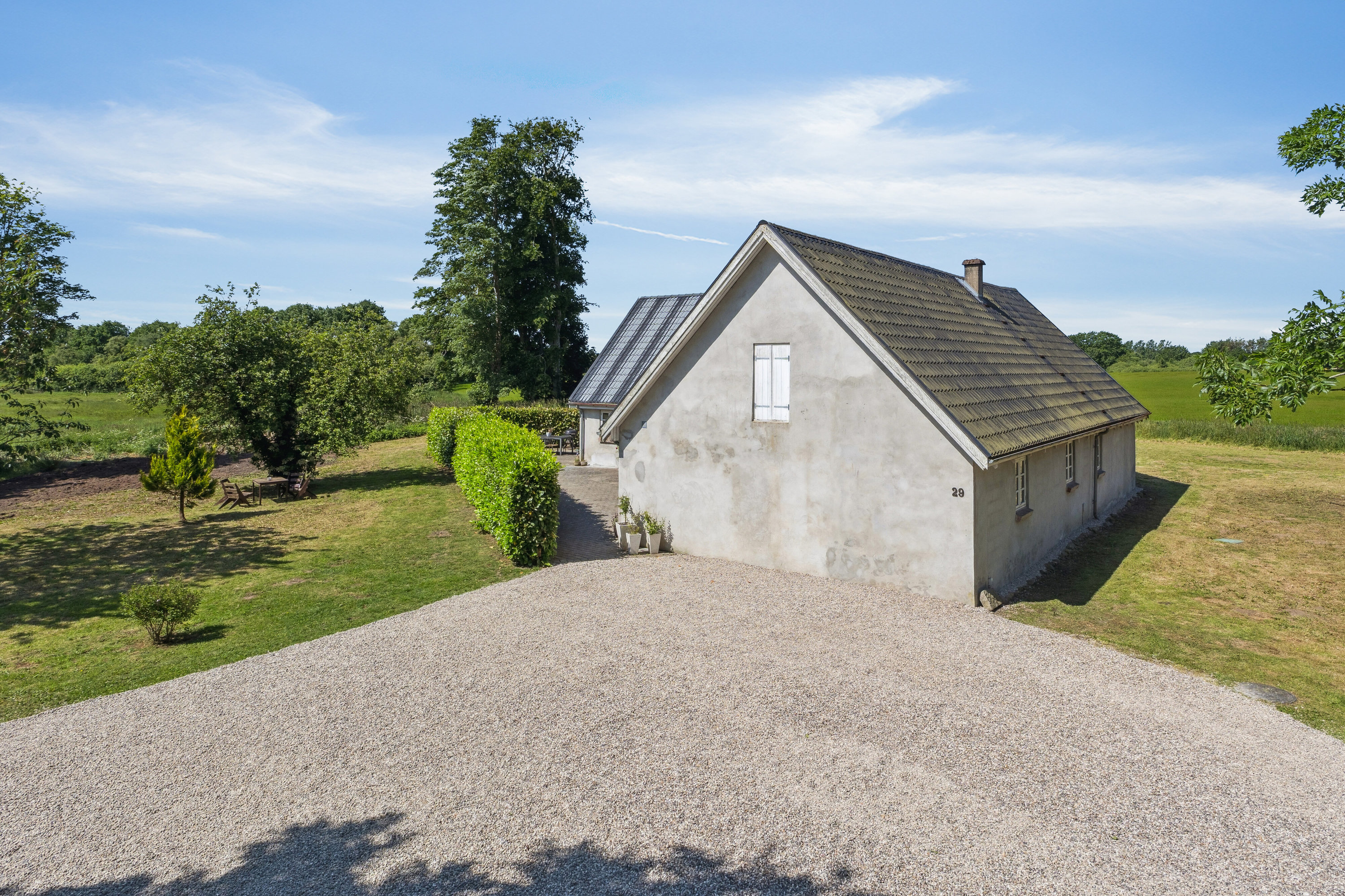 Fremhævet set fra haven billede i fuldskærmstilstand. Billede af Charlottenlundvej 29, 8620 Kjellerup