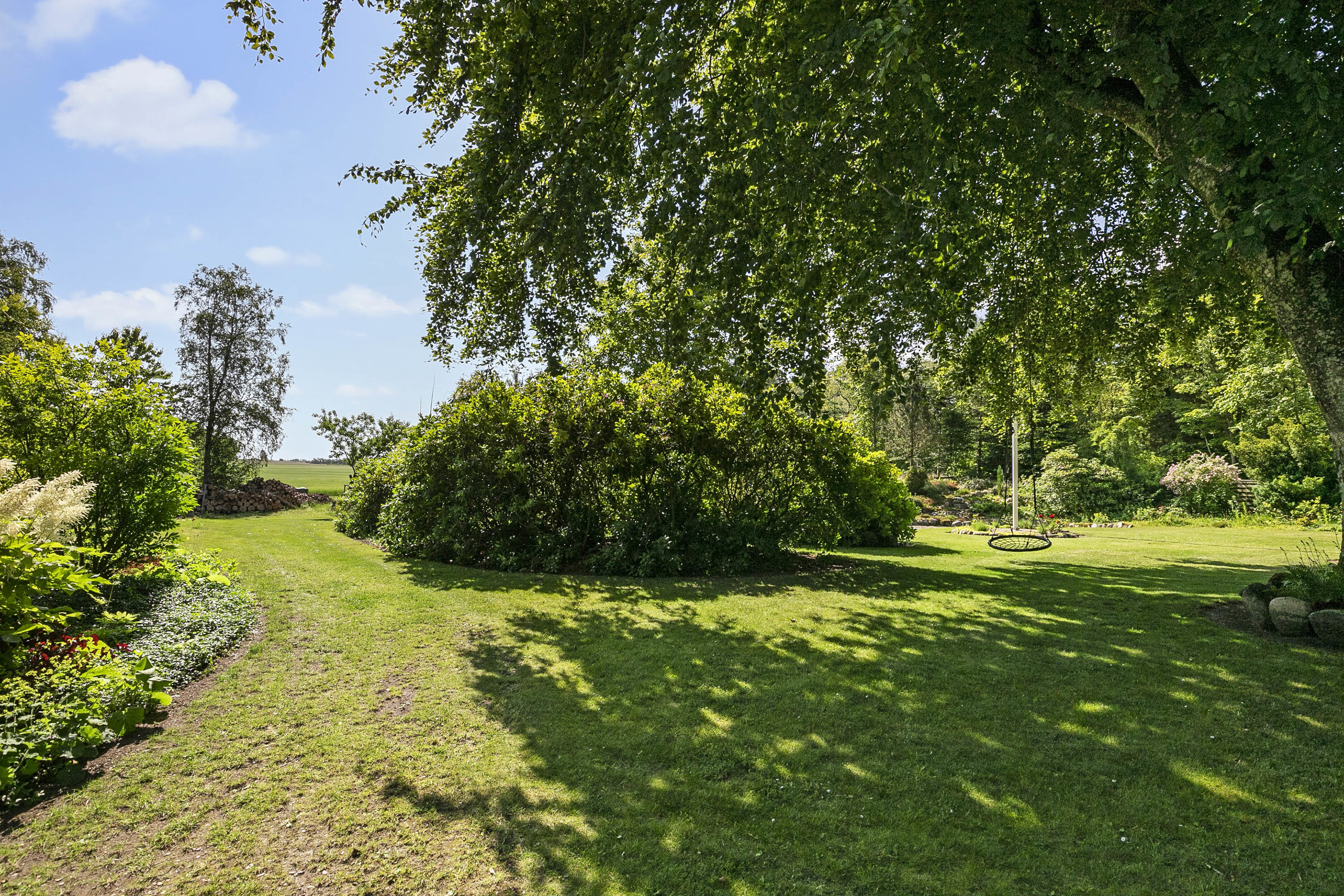 Fremhævet have billede i fuldskærmstilstand. Billede af Skatskovvej 35, Guldager, 9620 Aalestrup
