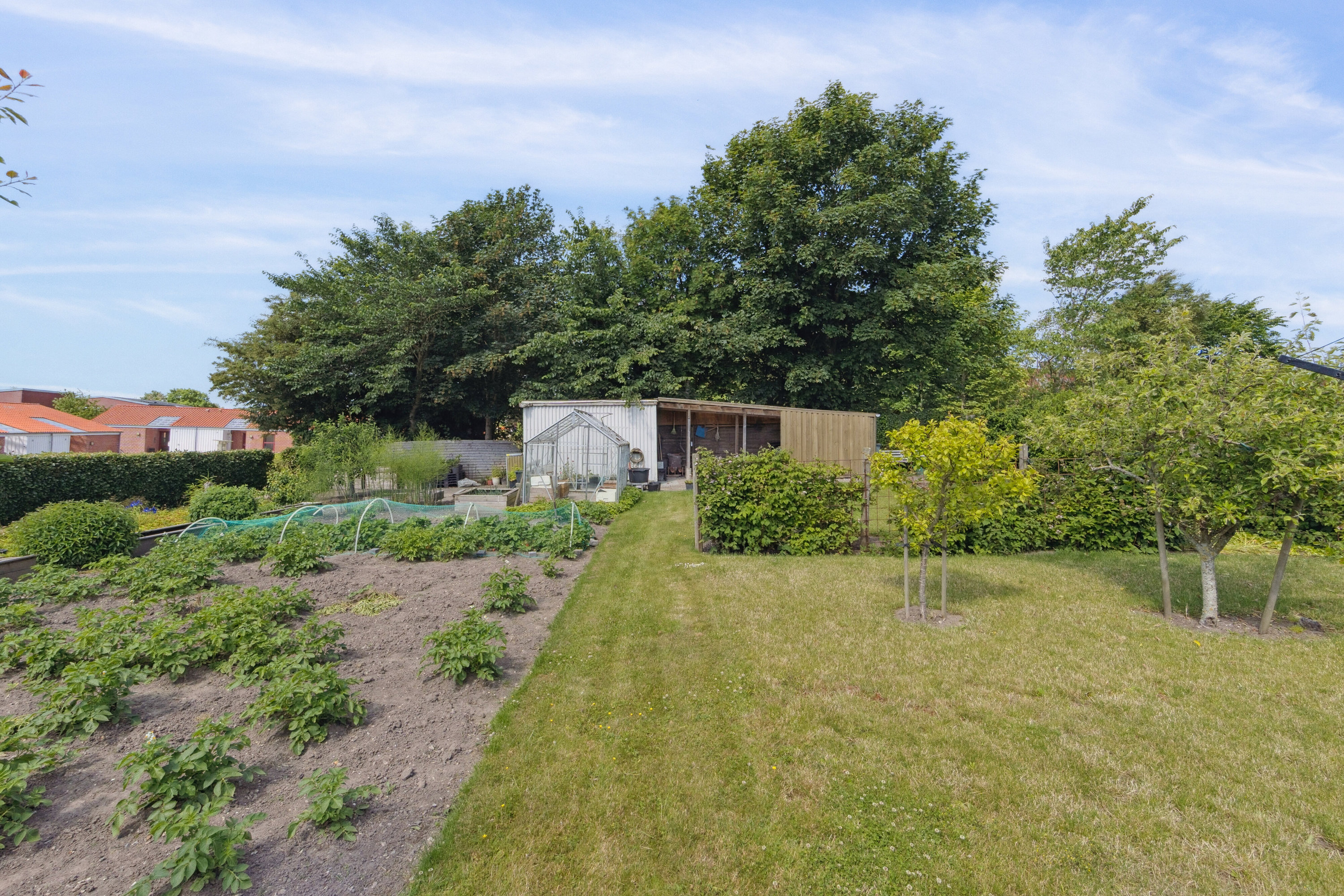 Fremhævet set fra haven billede i fuldskærmstilstand. Billede af Limfjordsgade 10, Koldby, 7752 Snedsted