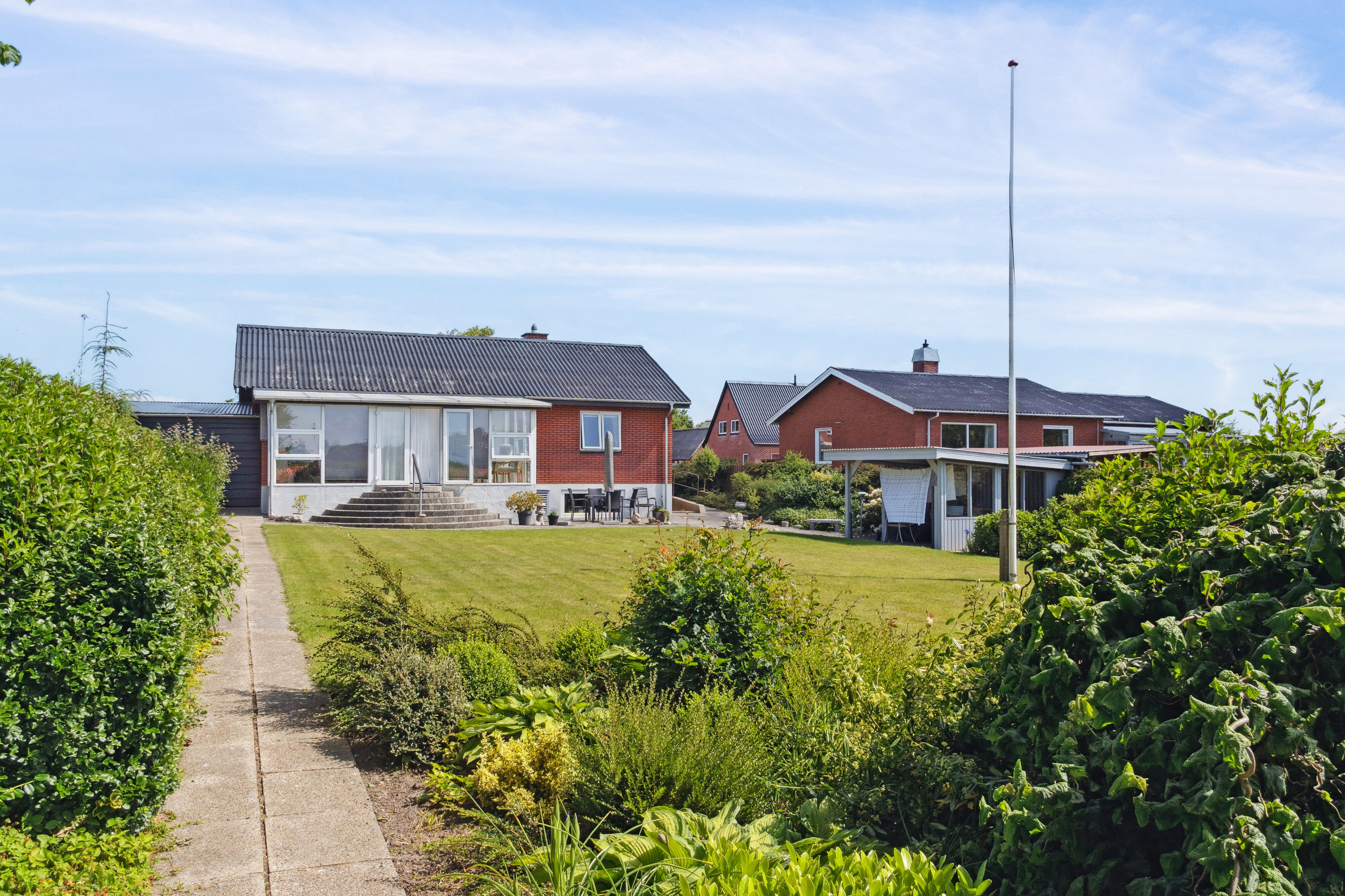 Fremhævet set fra haven billede i fuldskærmstilstand. Billede af Limfjordsgade 10, Koldby, 7752 Snedsted