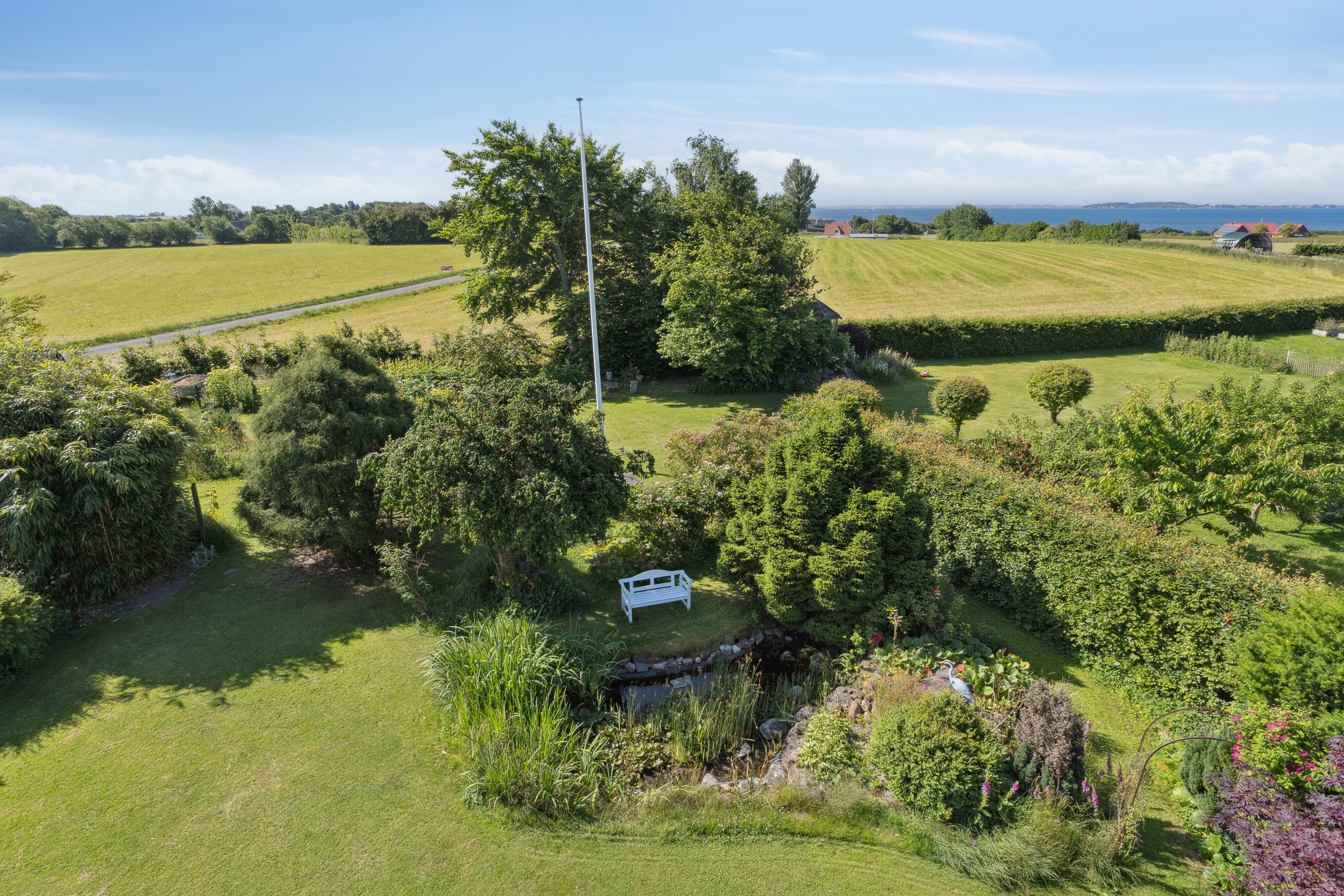 Fremhævet luftfoto billede i fuldskærmstilstand. Billede af Fjællebrovejen 35, Fjællebroen, 5762 Vester Skerninge