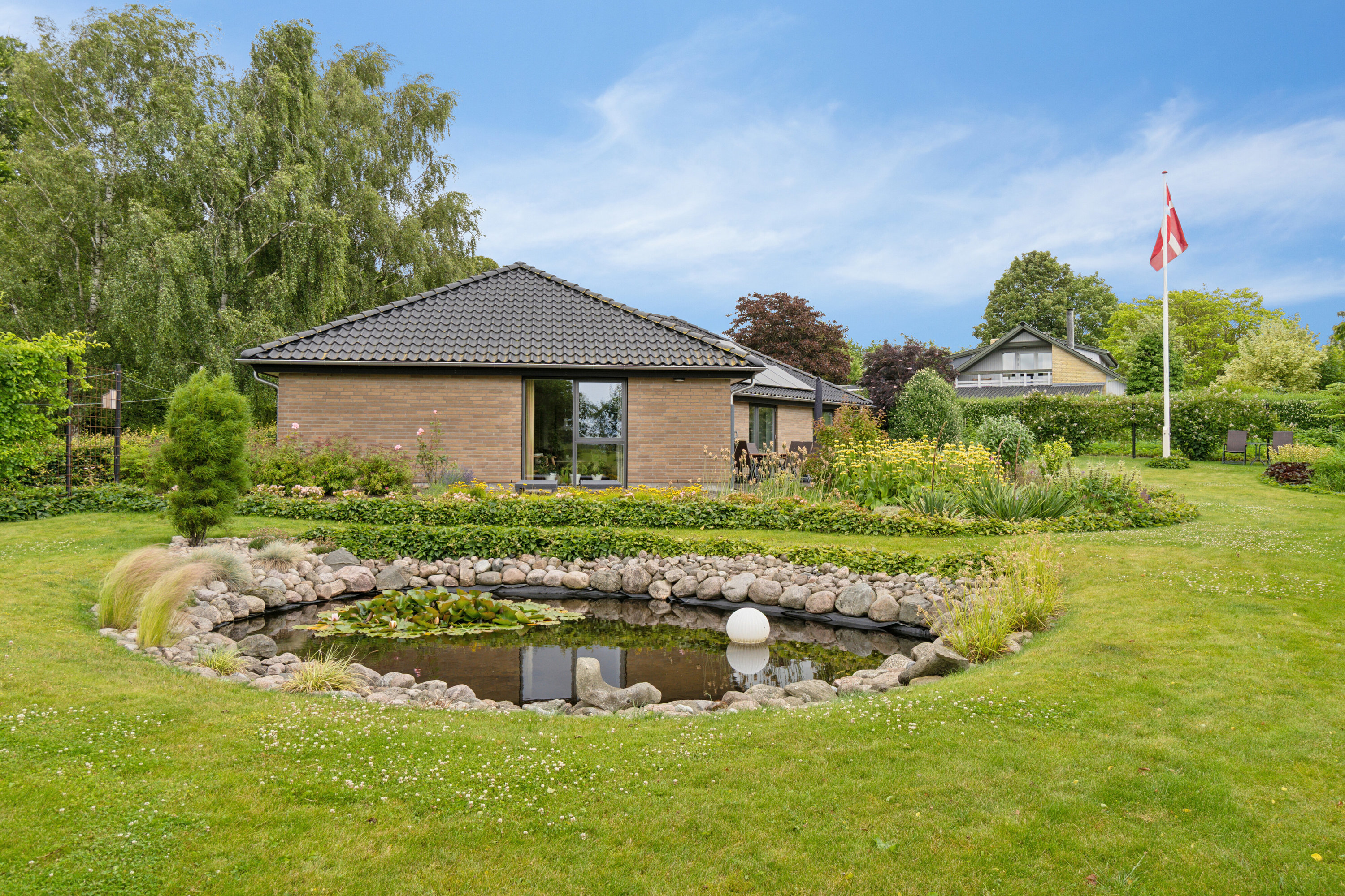 Fremhævet set fra haven billede i fuldskærmstilstand. Billede af Fodbygade 27B, Fodby, 4700 Næstved