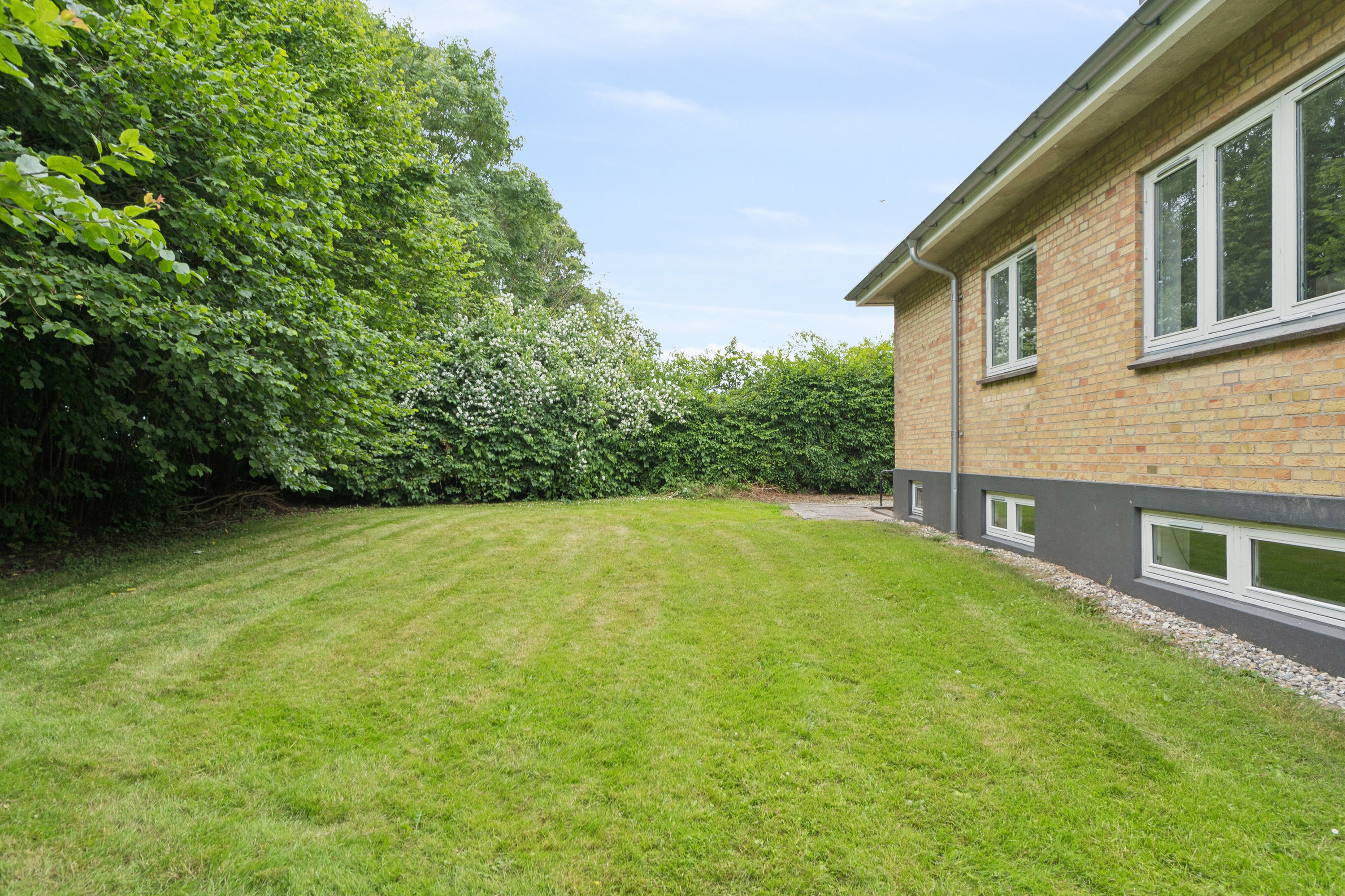 Fremhævet set fra haven billede i fuldskærmstilstand. Billede af Torupvej 22, Torup, 5485 Skamby