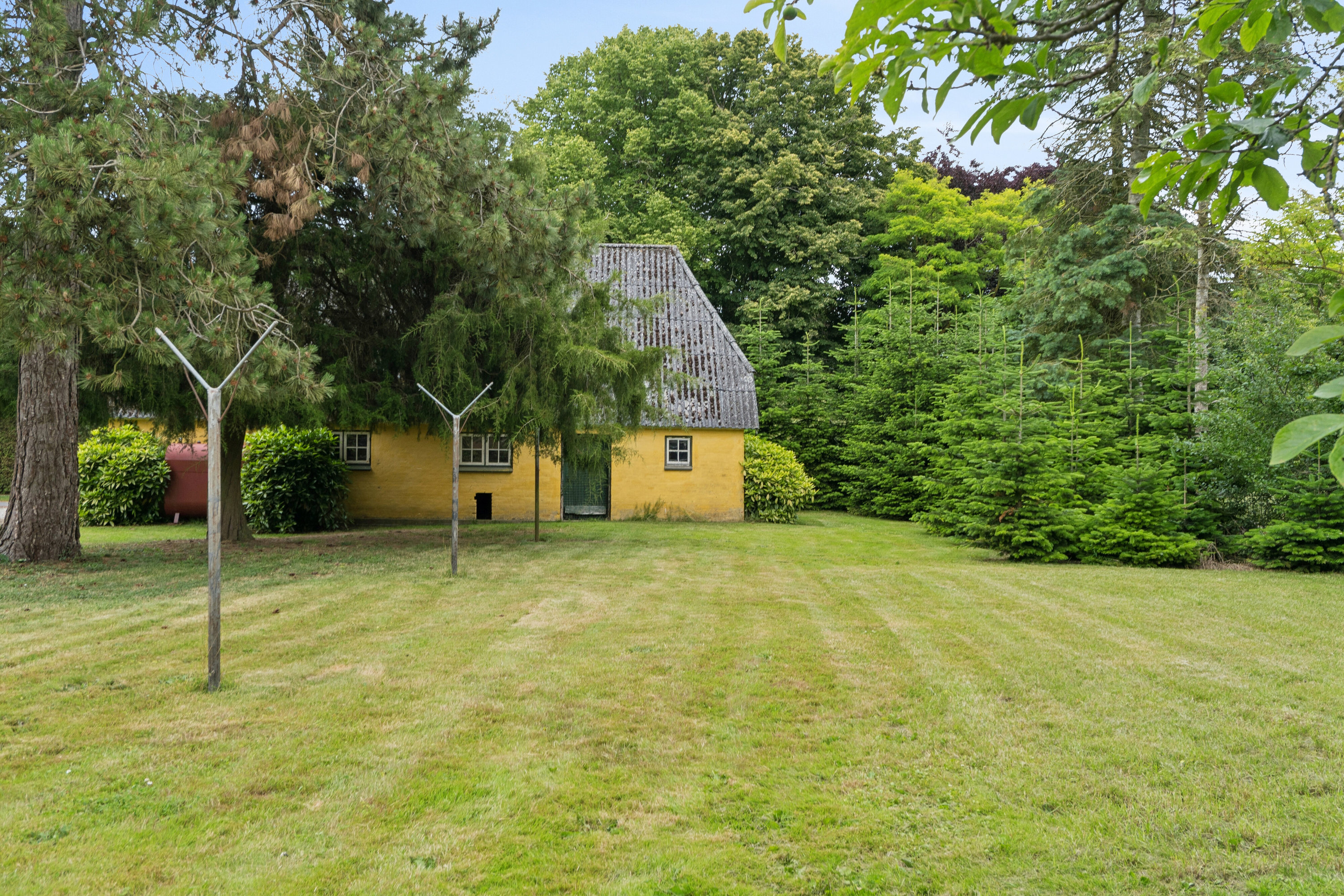 Fremhævet set fra haven billede i fuldskærmstilstand. Billede af Torupvej 22, Torup, 5485 Skamby