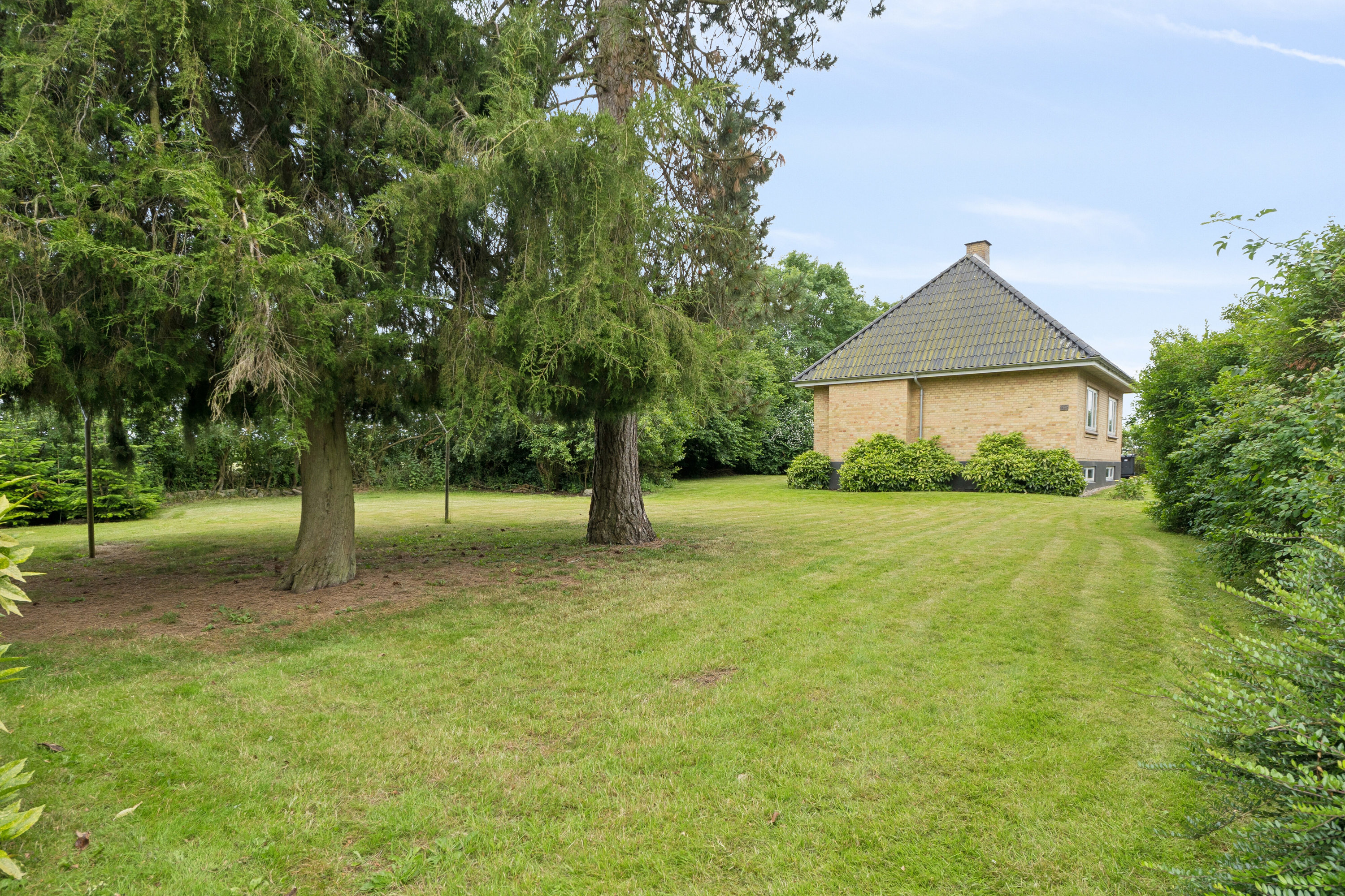 Fremhævet set fra haven billede i fuldskærmstilstand. Billede af Torupvej 22, Torup, 5485 Skamby