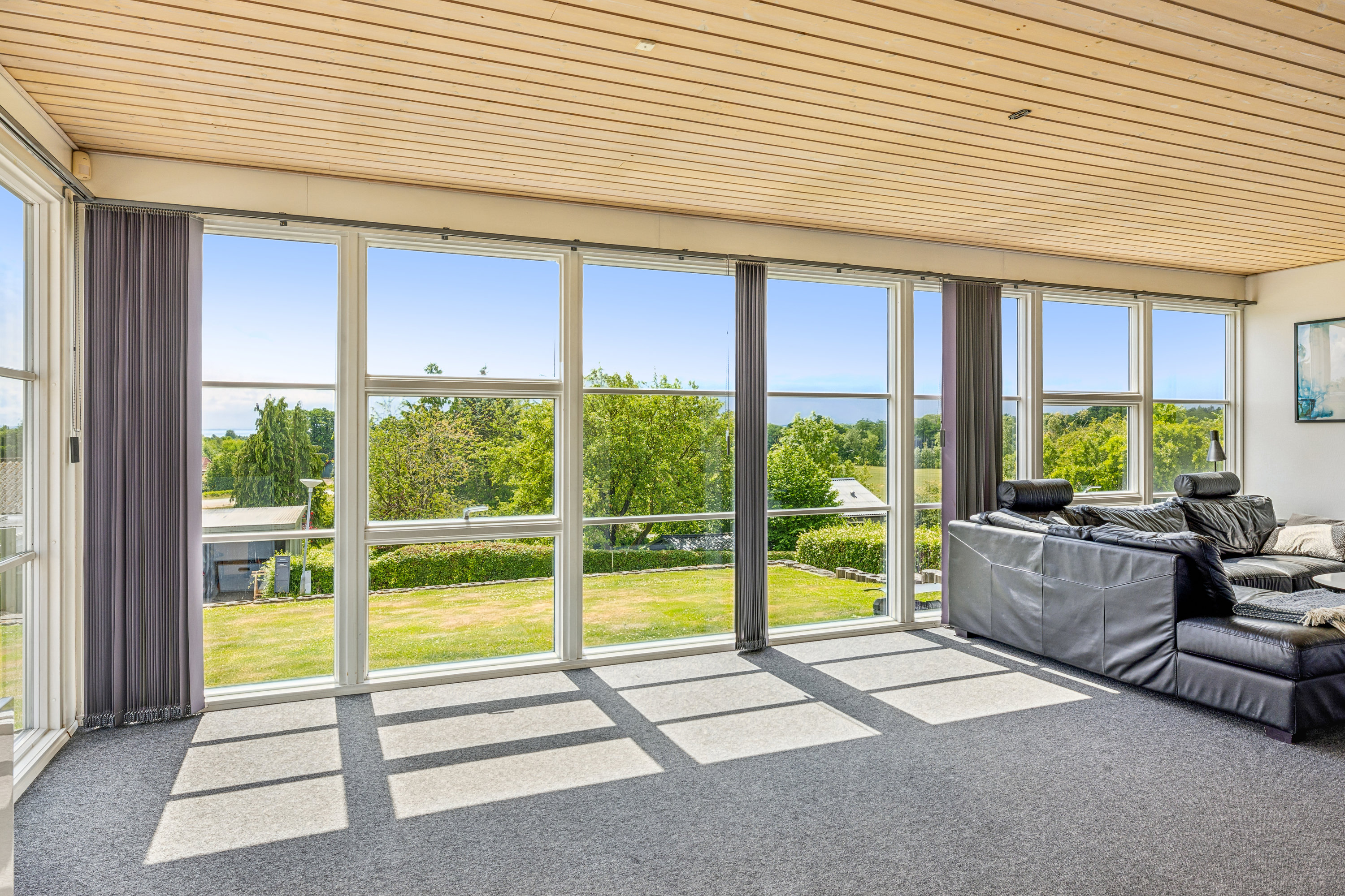 Fremhævet terrasse billede i fuldskærmstilstand. Billede af Lerbakken 38, Følle, 8410 Rønde