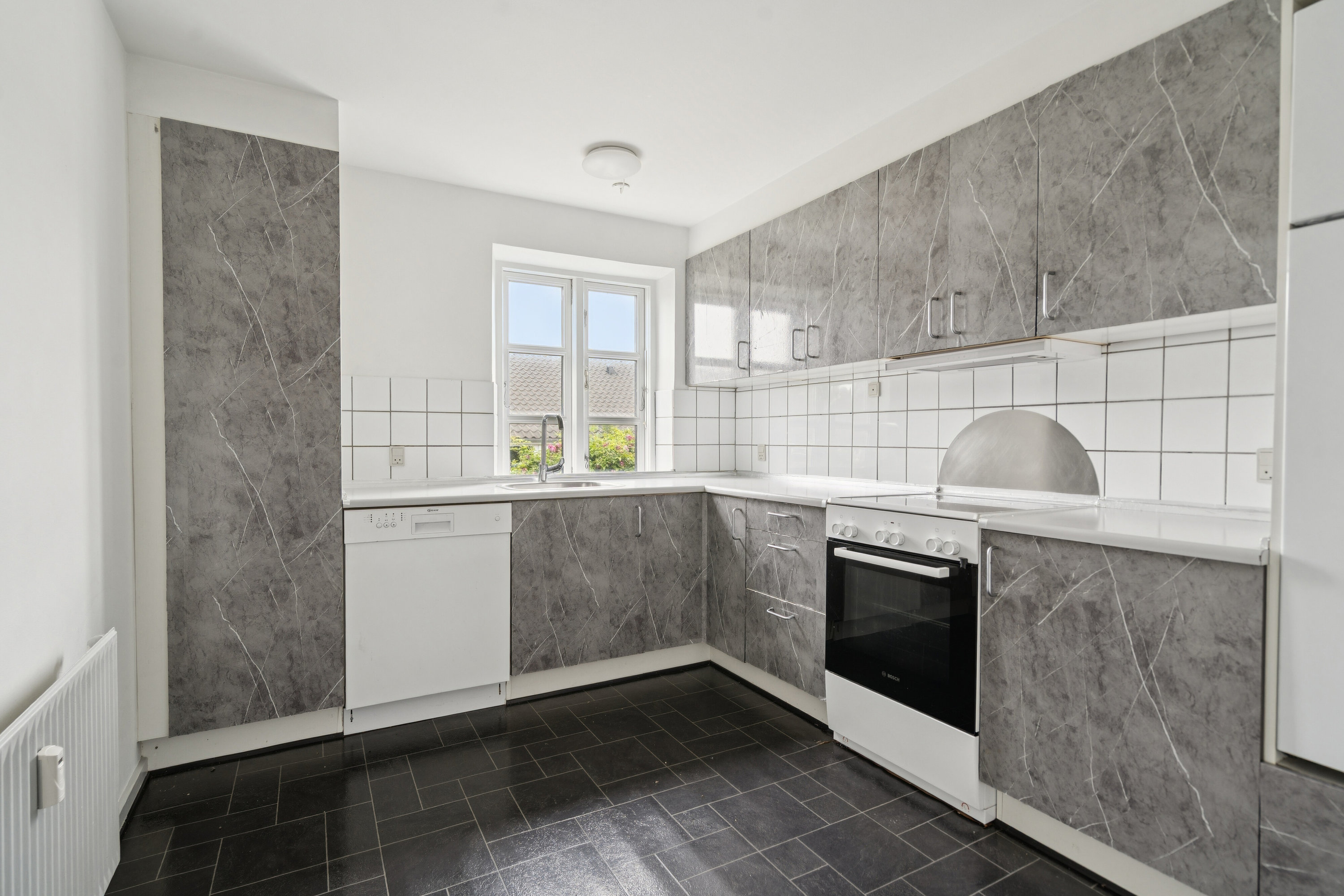 Fremhævet køkken billede i fuldskærmstilstand. Billede af Nyborgvej 232A, 5220 Odense SØ