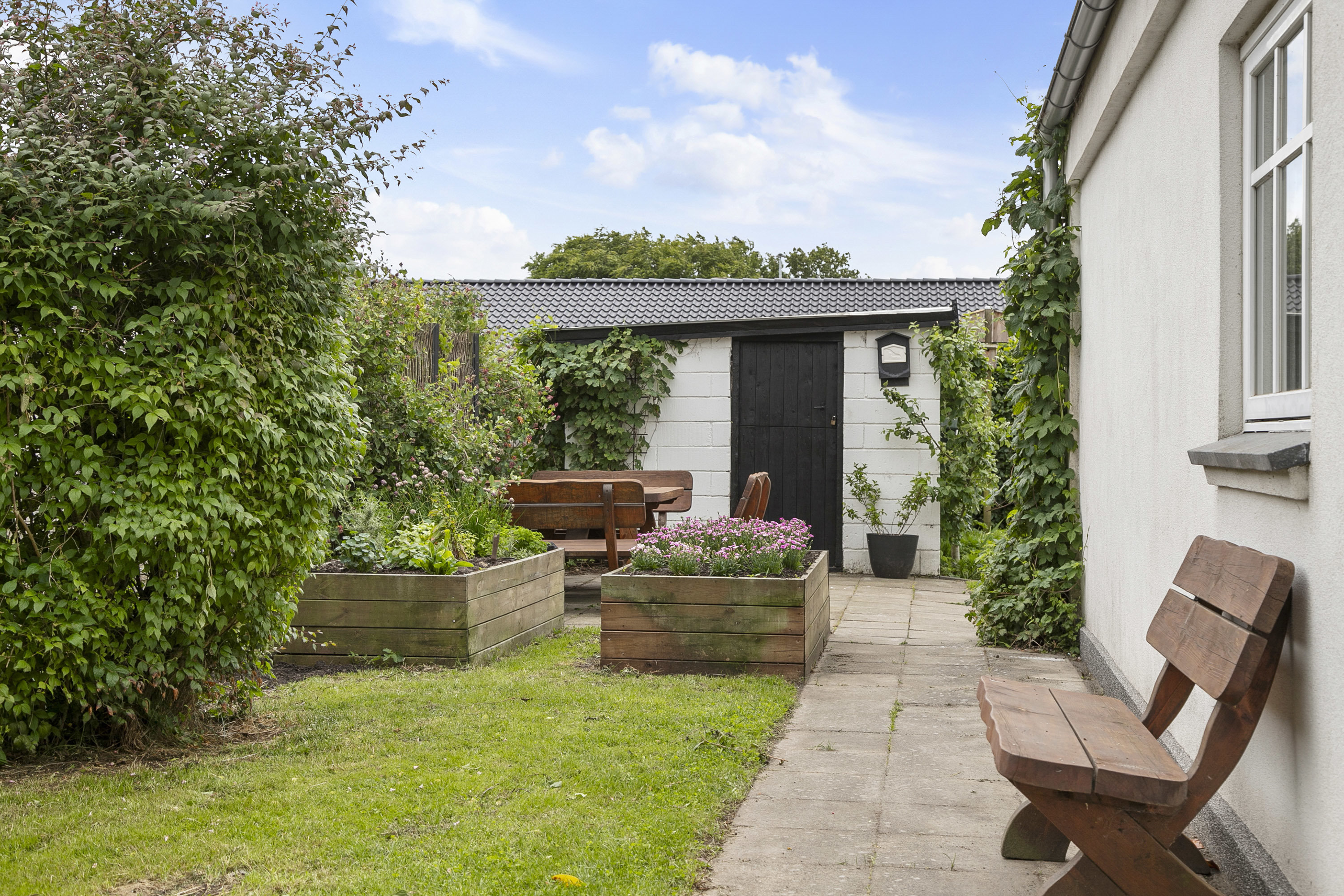 Fremhævet have billede i fuldskærmstilstand. Billede af Damgade 2, 9700 Brønderslev