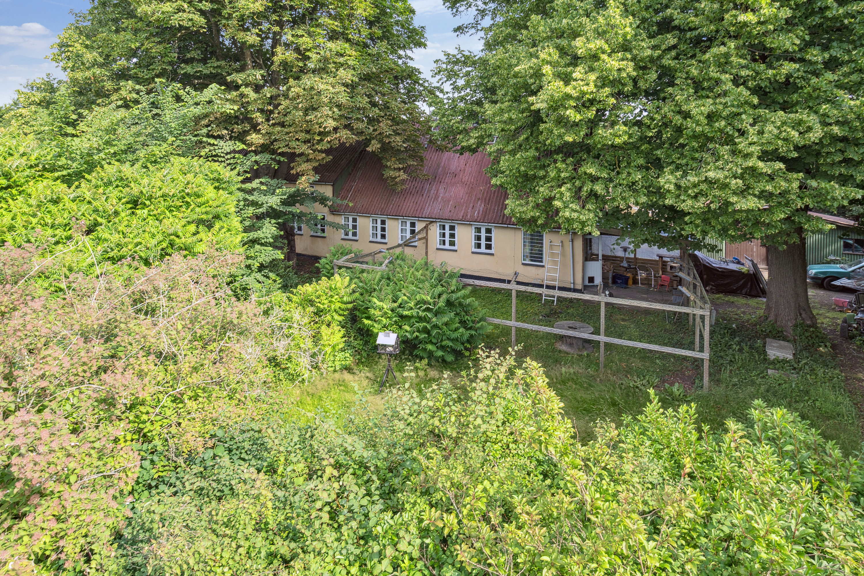 Fremhævet set fra haven billede i fuldskærmstilstand. Billede af Merløsevej 25, 4370 Store Merløse