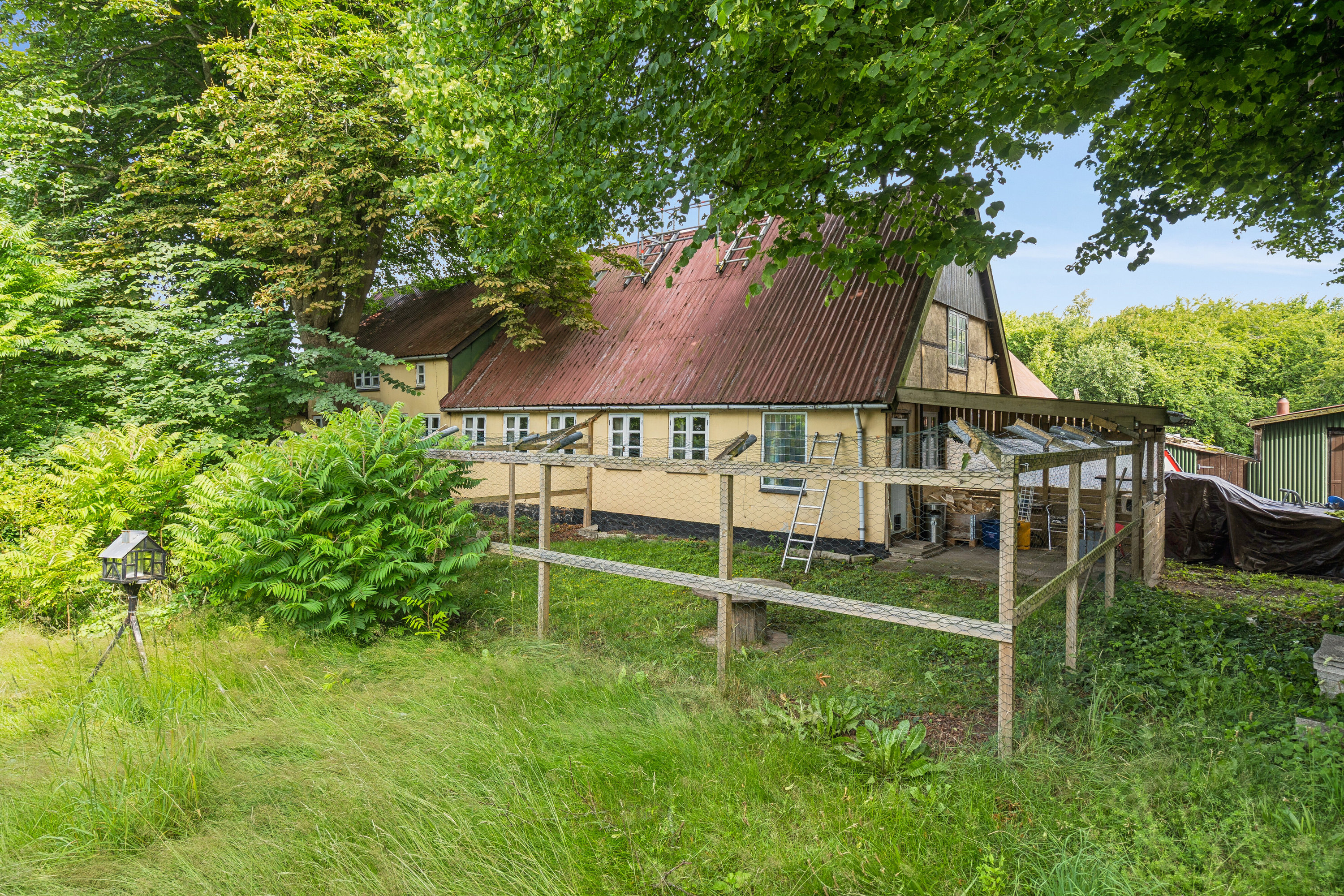 Fremhævet set fra haven billede i fuldskærmstilstand. Billede af Merløsevej 25, 4370 Store Merløse