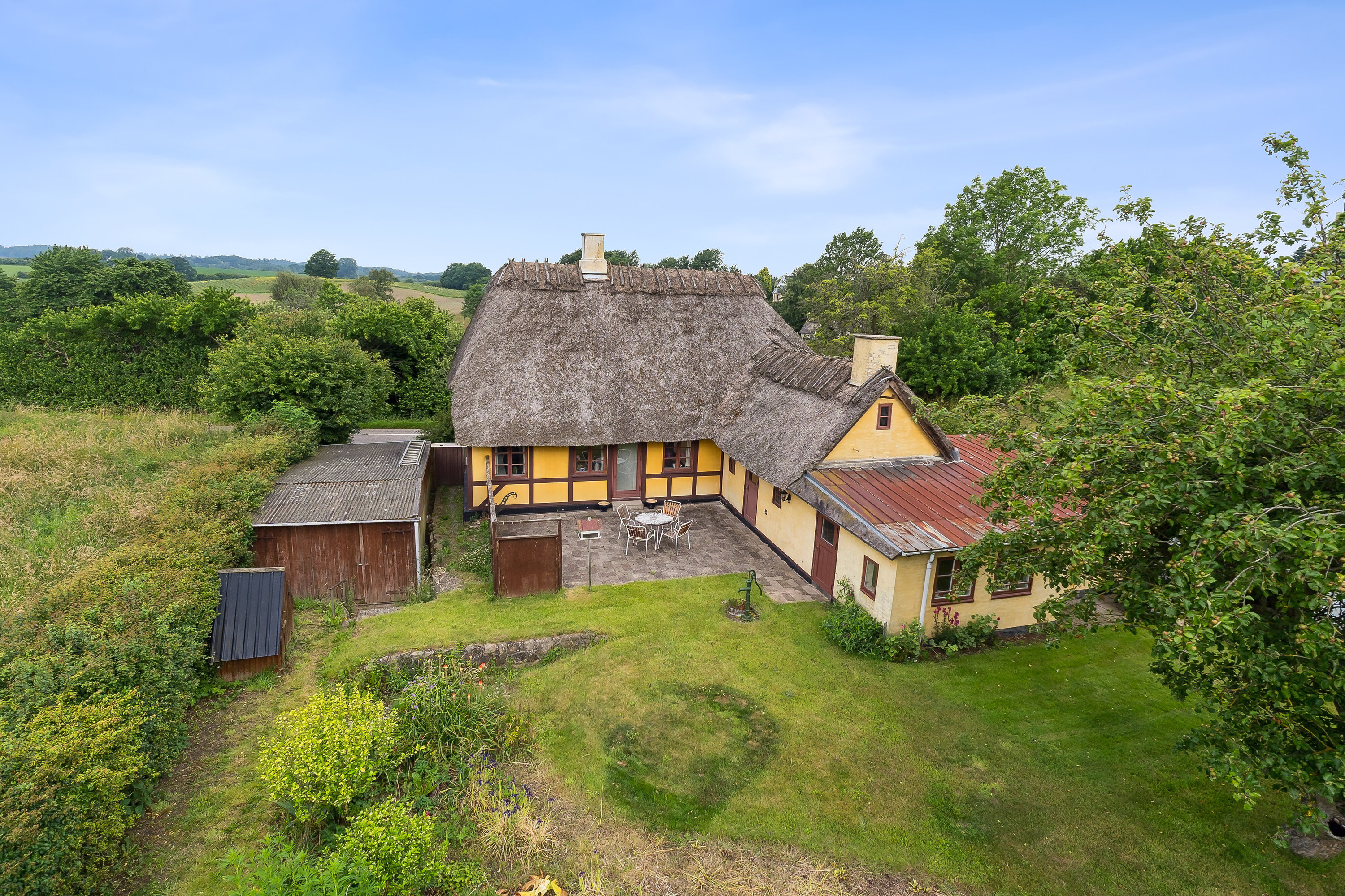 Fremhævet set fra haven billede i fuldskærmstilstand. Billede af Brændeskovvej 18, Tved, 5700 Svendborg