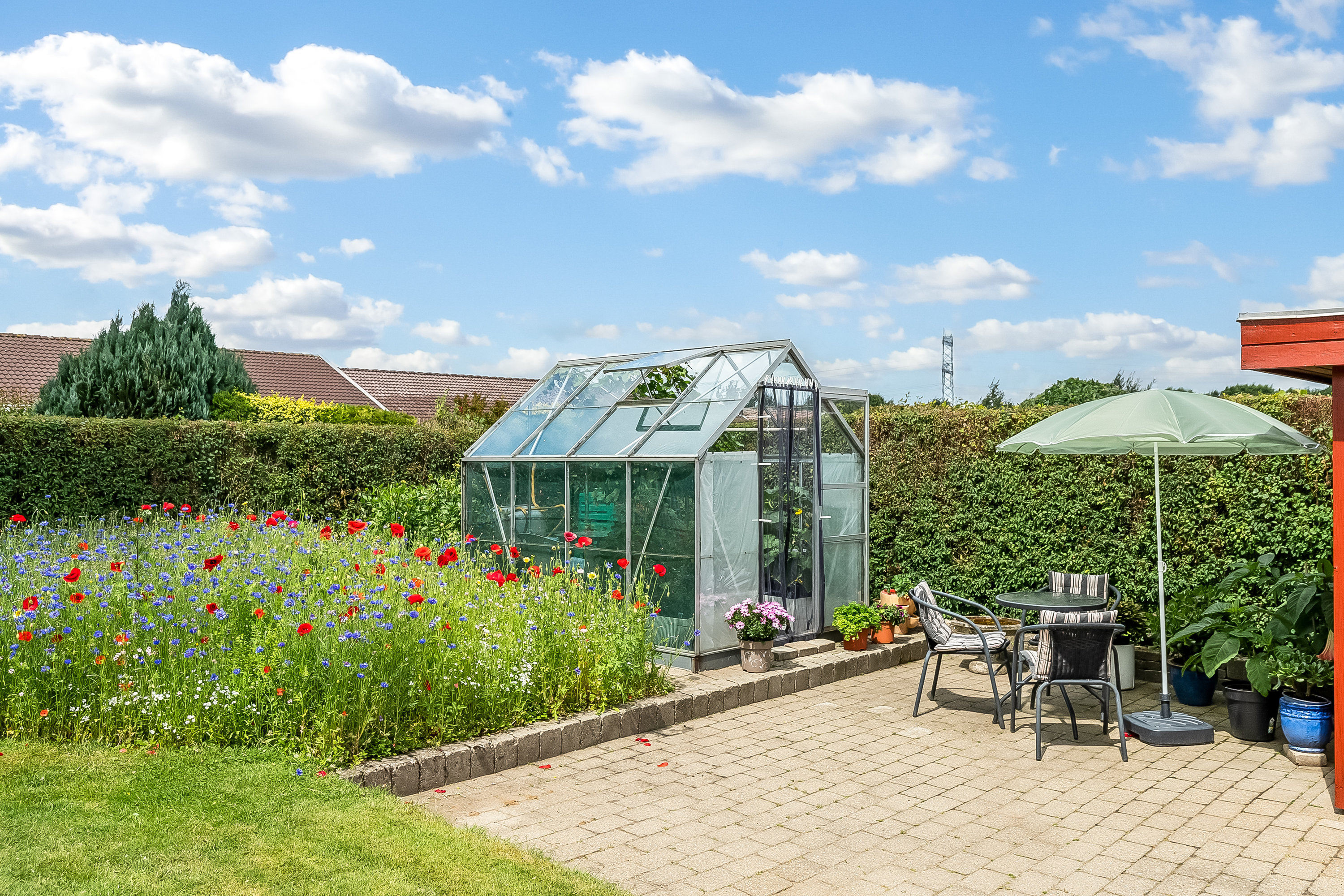 Fremhævet terrasse billede i fuldskærmstilstand. Billede af Julivænget 61, Bramdrupdam, 6000 Kolding