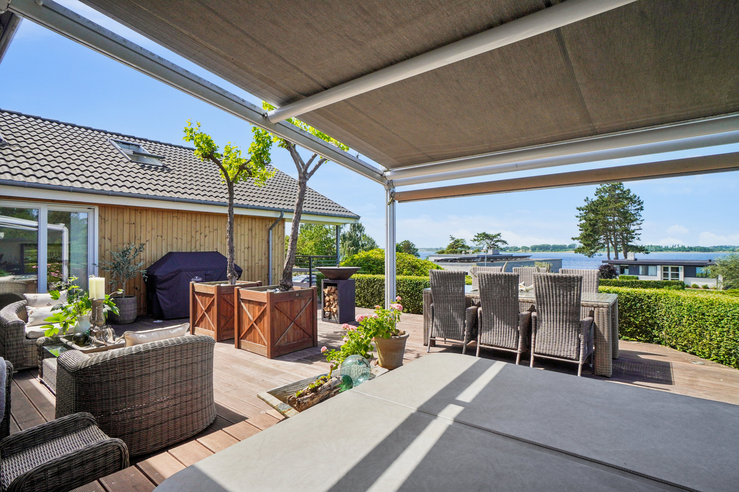 Fremhævet overdækket terrasse billede i fuldskærmstilstand. Billede af Strandagervej 16, 4040 Jyllinge