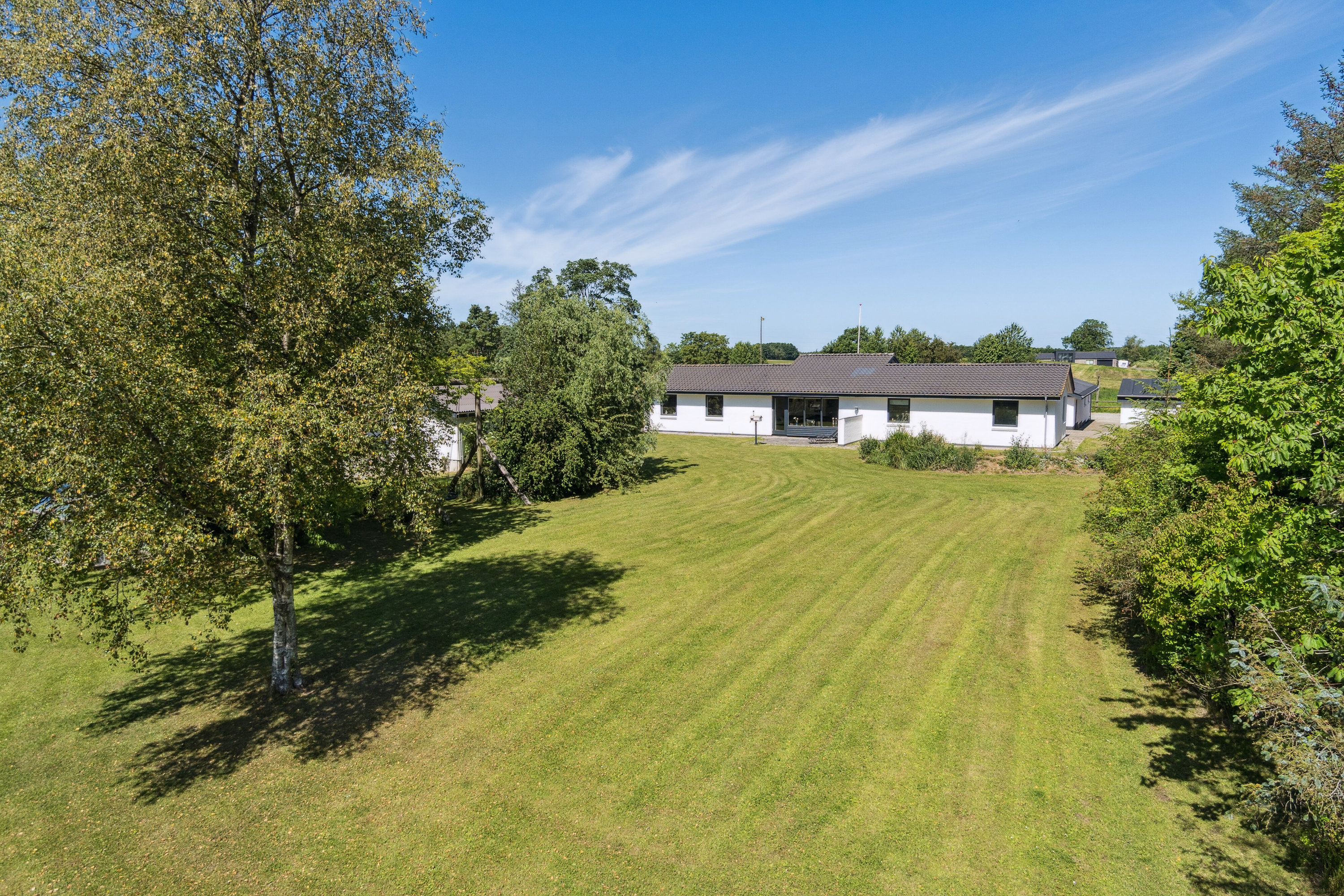 Fremhævet set fra haven billede i fuldskærmstilstand. Billede af Ny Sebberupvej 17, 8723 Løsning