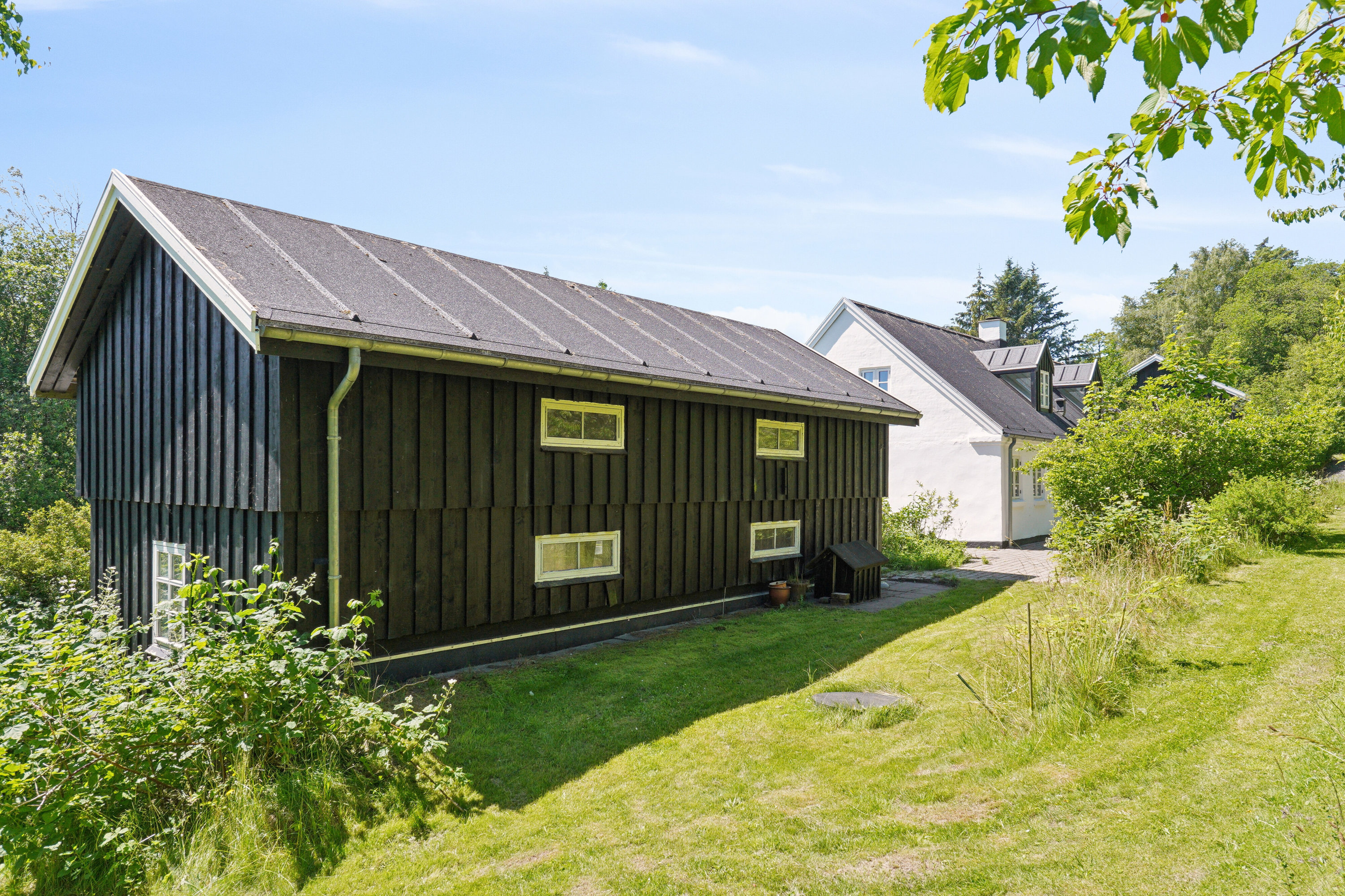 Fremhævet set fra haven billede i fuldskærmstilstand. Billede af Granvænget 25, Bjergby, 9800 Hjørring