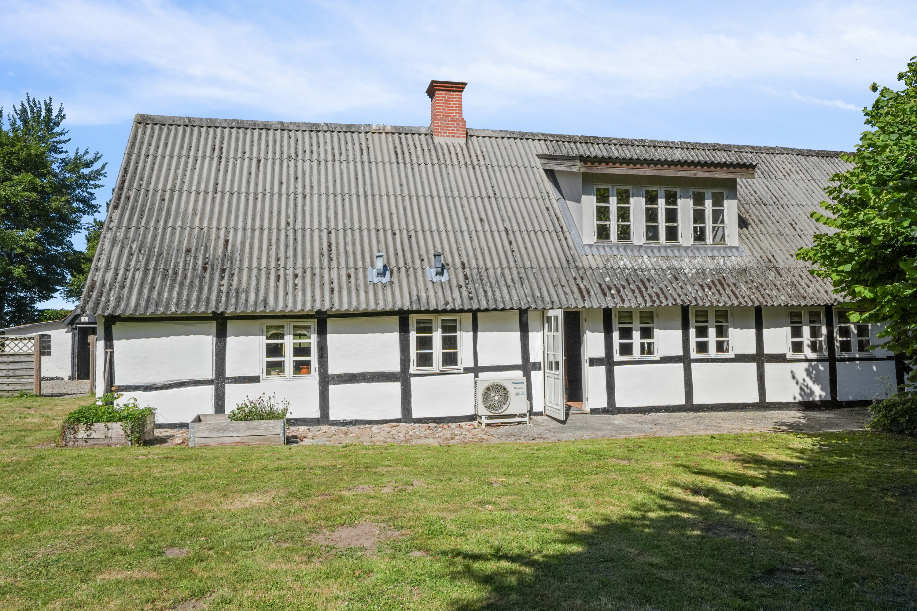 Fremhævet set fra haven billede i fuldskærmstilstand. Billede af Klæsøvej 4, Klæsø, 5900 Rudkøbing