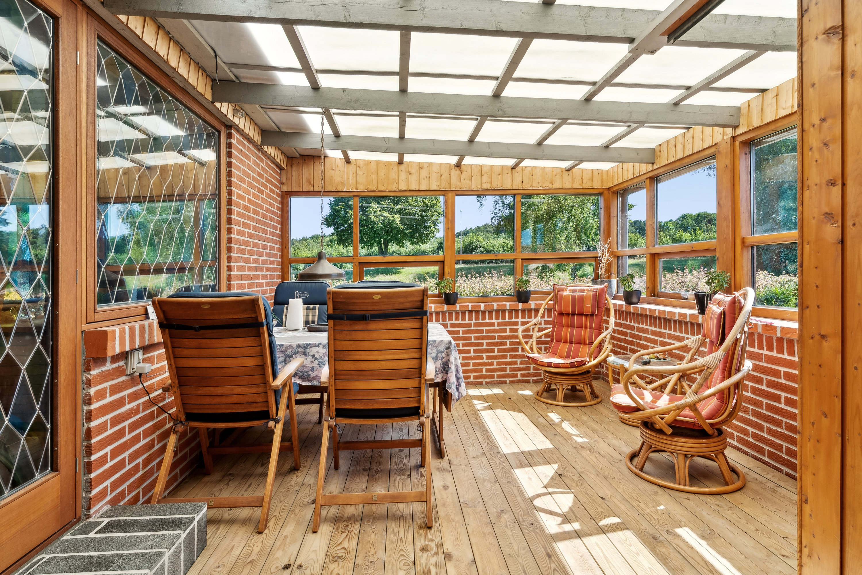 Fremhævet udestue billede i fuldskærmstilstand. Billede af Lærkevej 15, 8850 Bjerringbro