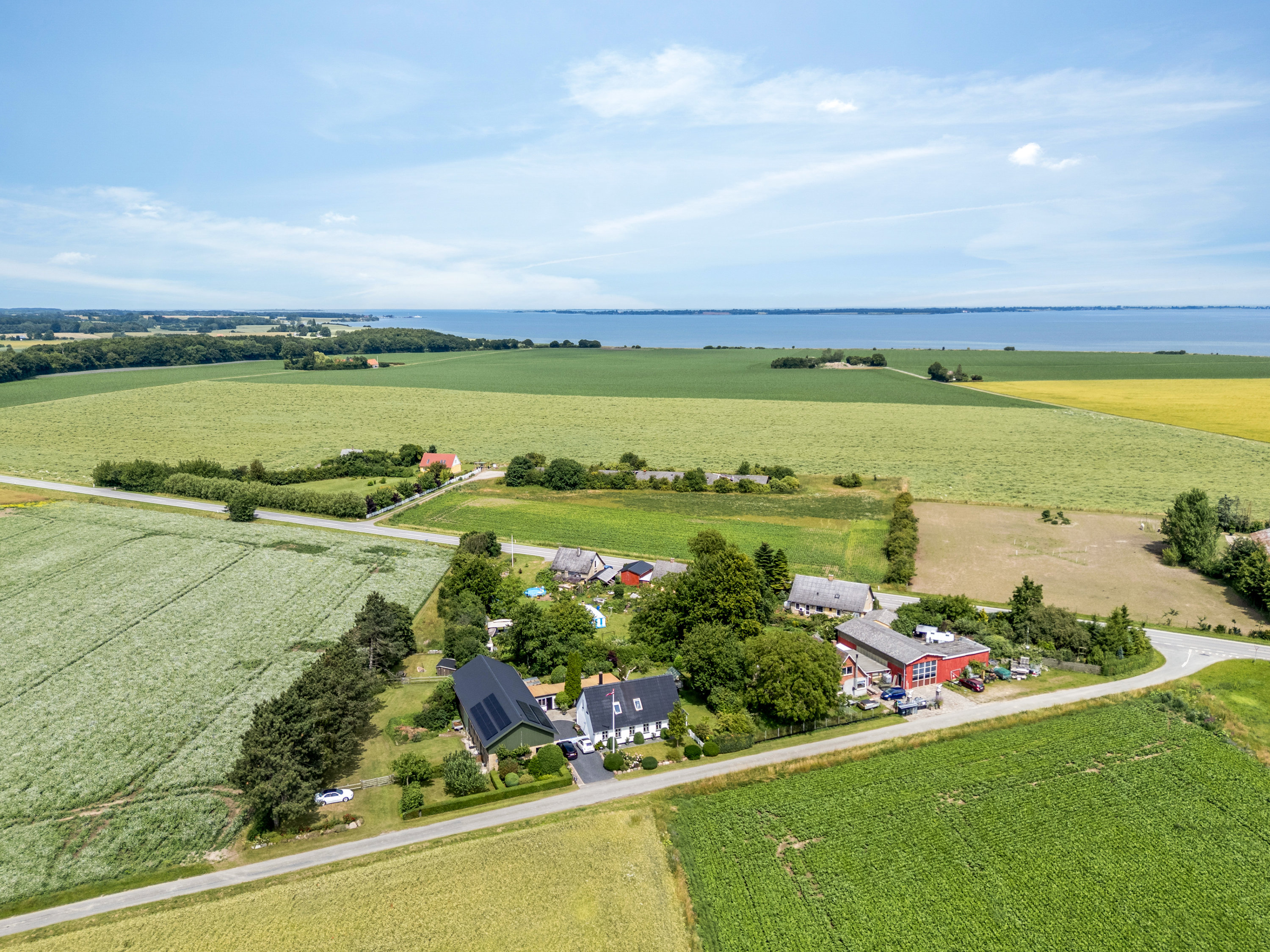 Fremhævet luftfoto billede i fuldskærmstilstand. Billede af Saltvig Hovvej 28, 4952 Stokkemarke