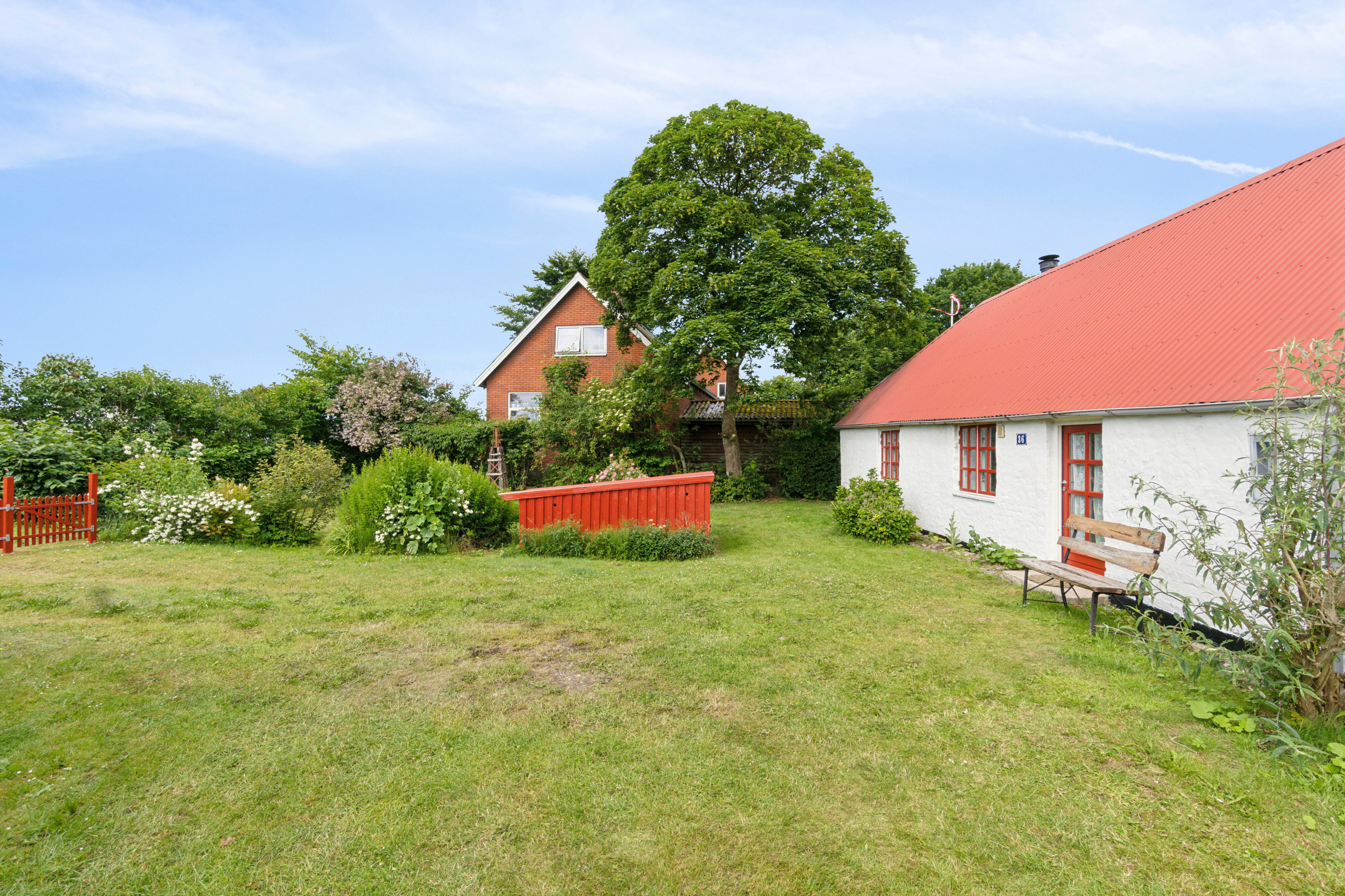 Fremhævet set fra haven billede i fuldskærmstilstand. Billede af Borgergade 36, Koldby, 7752 Snedsted