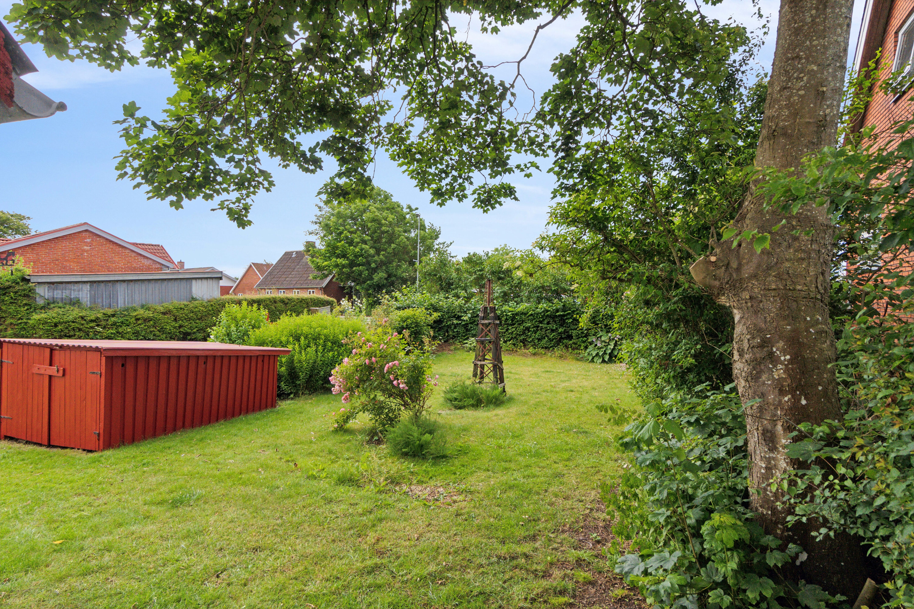 Fremhævet set fra haven billede i fuldskærmstilstand. Billede af Borgergade 36, Koldby, 7752 Snedsted