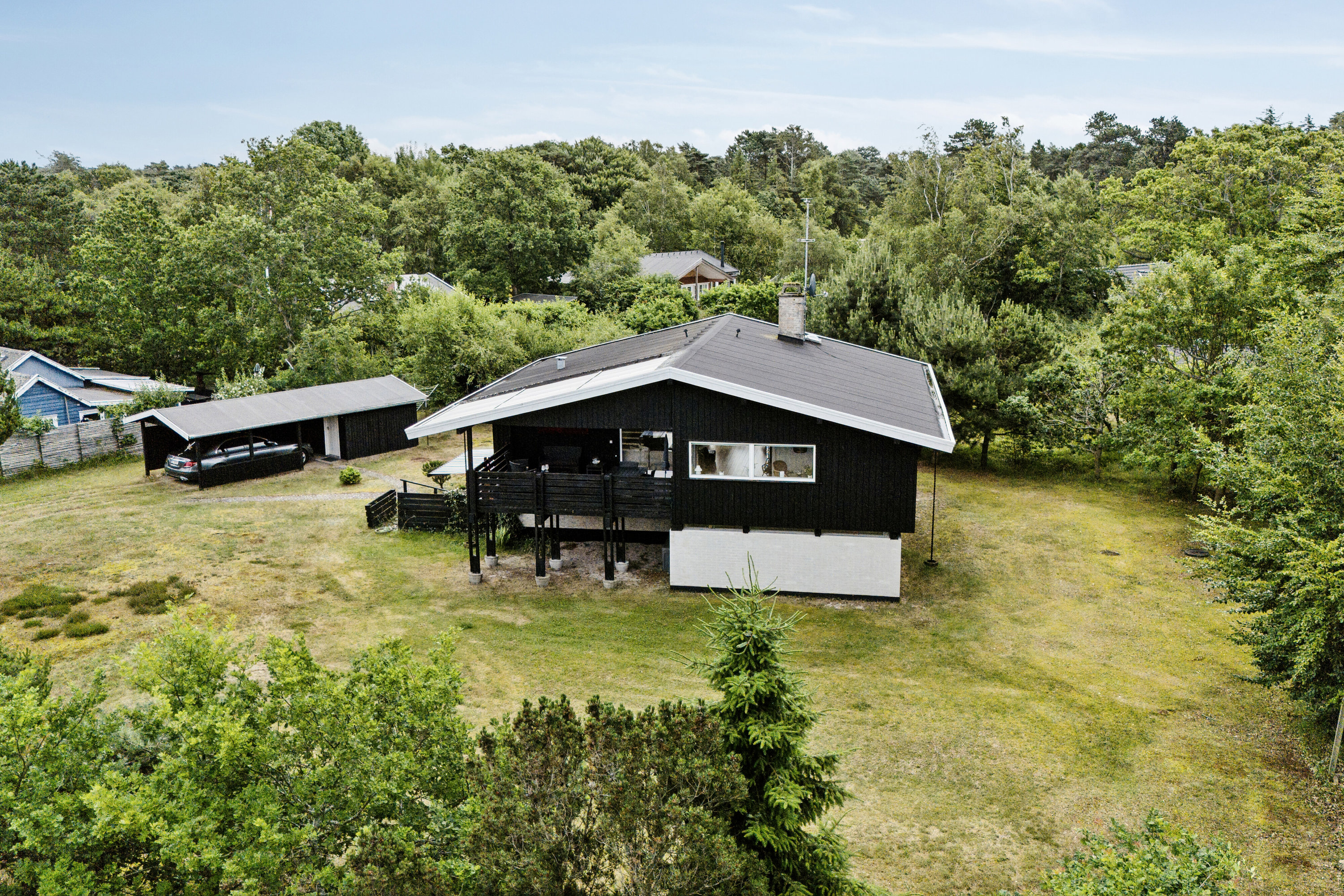 Fremhævet set fra haven billede i fuldskærmstilstand. Billede af Vibo Strandvej 11, 4500 Nykøbing Sj