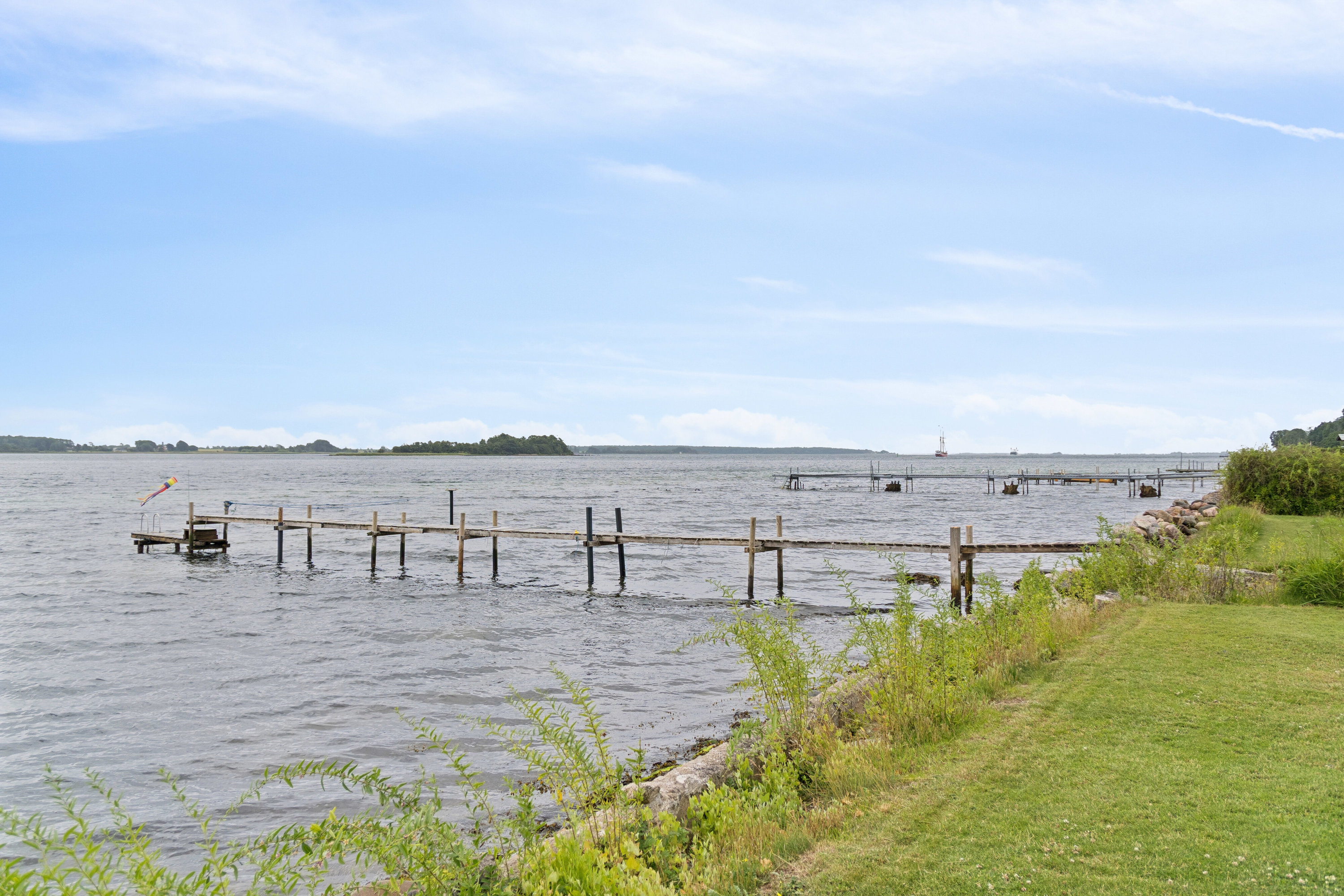 Fremhævet havudsigt billede i fuldskærmstilstand. Billede af Sætting Strandvej 32, 5700 Svendborg