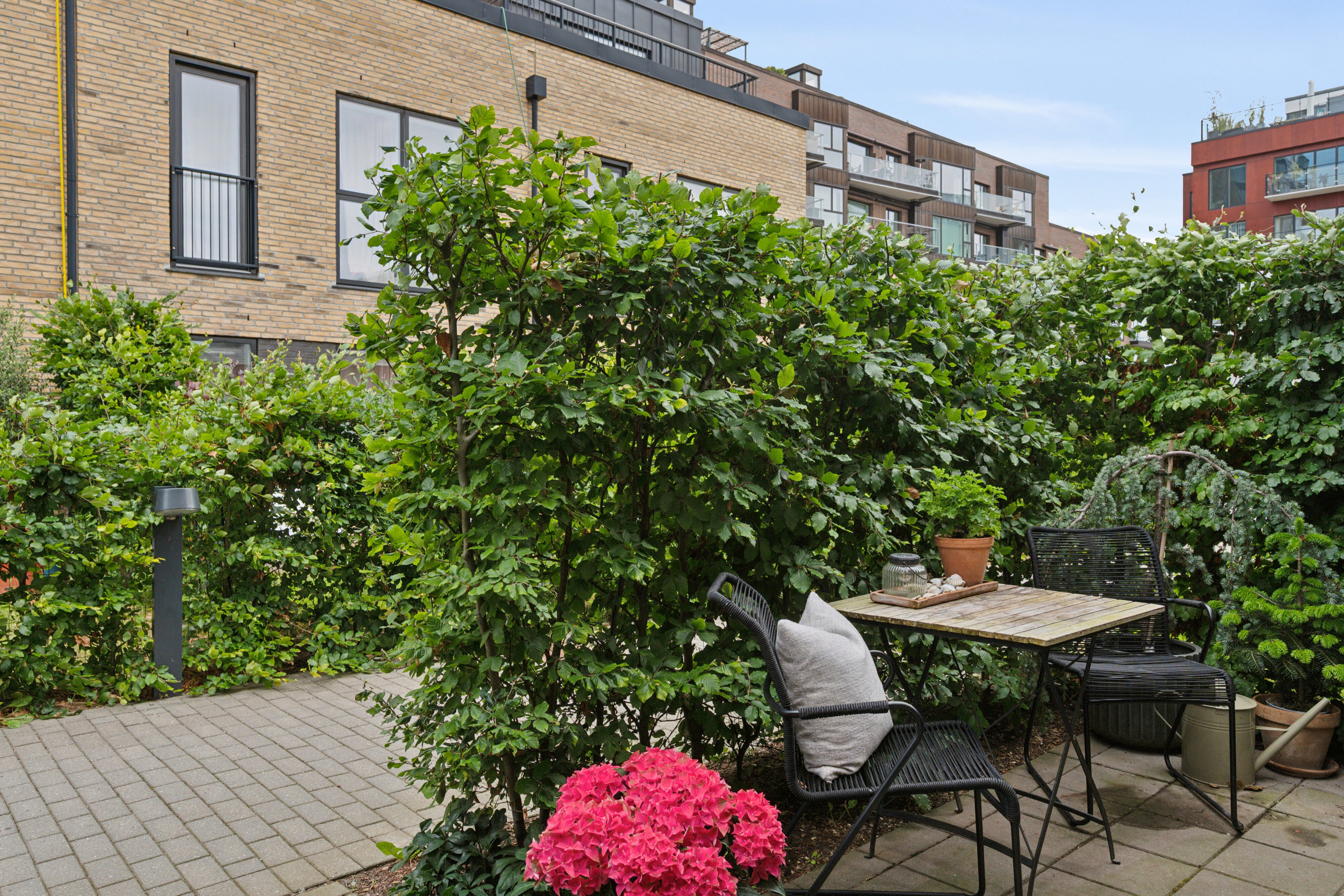 Fremhævet set fra haven billede i fuldskærmstilstand. Billede af Amager Strandvej 118A, 2300 København S