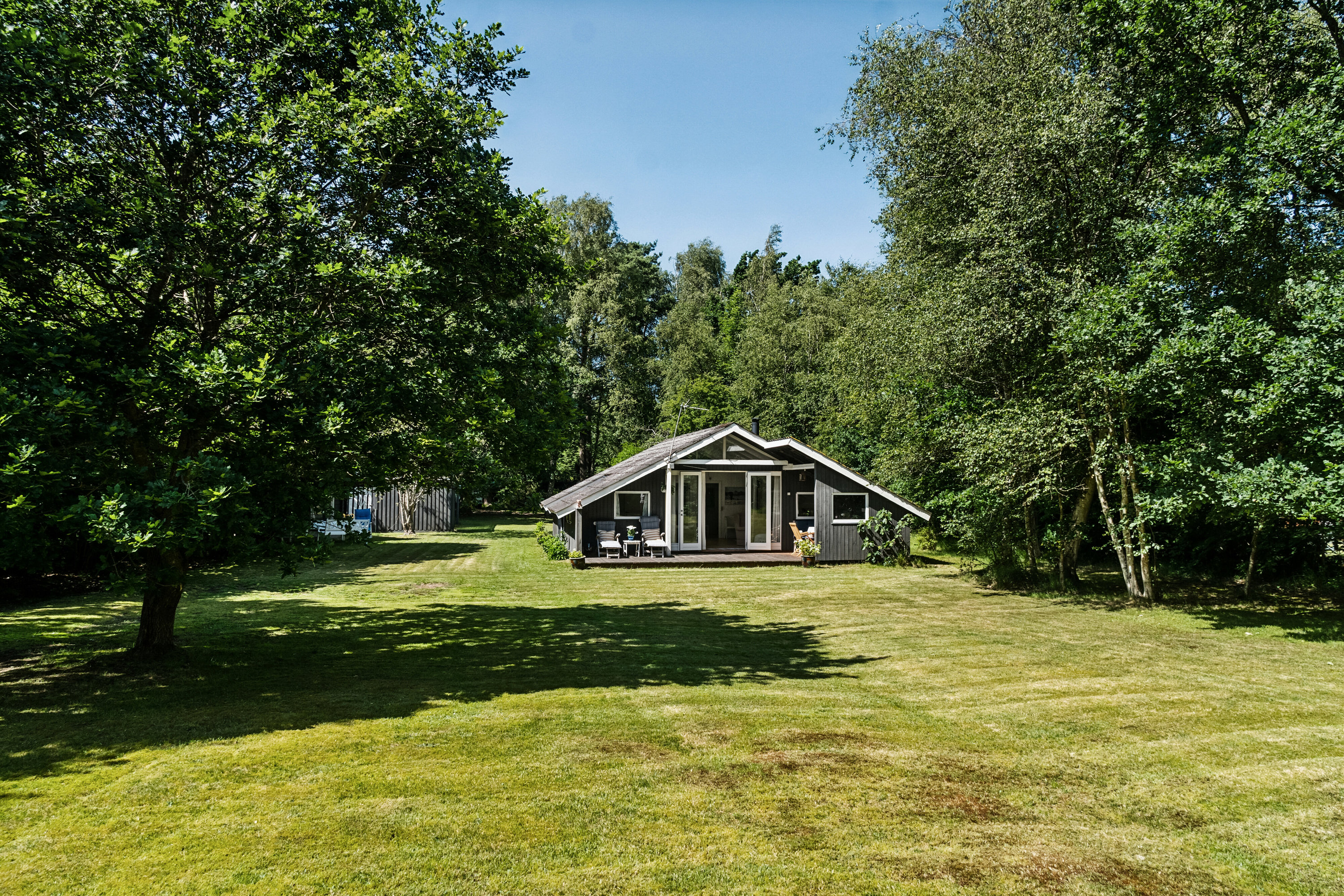 Fremhævet set fra haven billede i fuldskærmstilstand. Billede af Nåletræsvænget 5, 4581 Rørvig