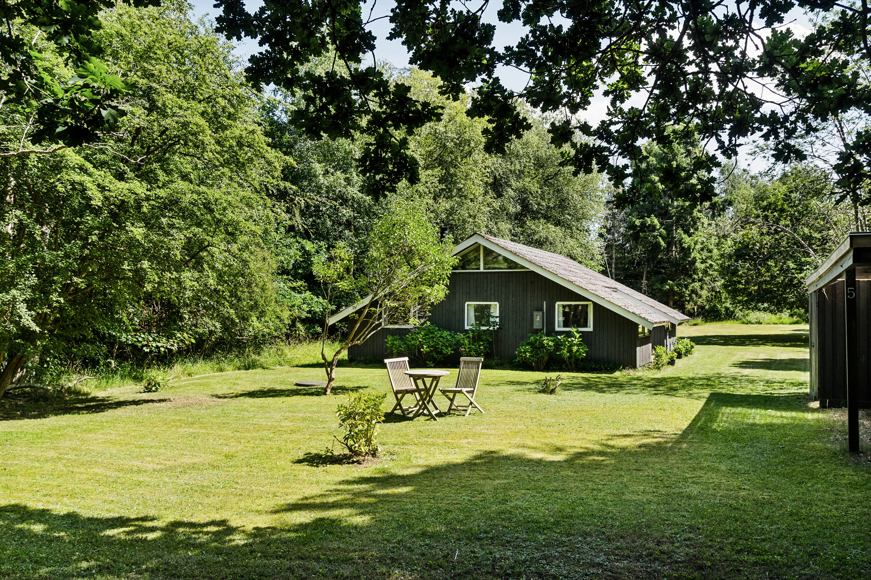 Fremhævet set fra haven billede i fuldskærmstilstand. Billede af Nåletræsvænget 5, 4581 Rørvig