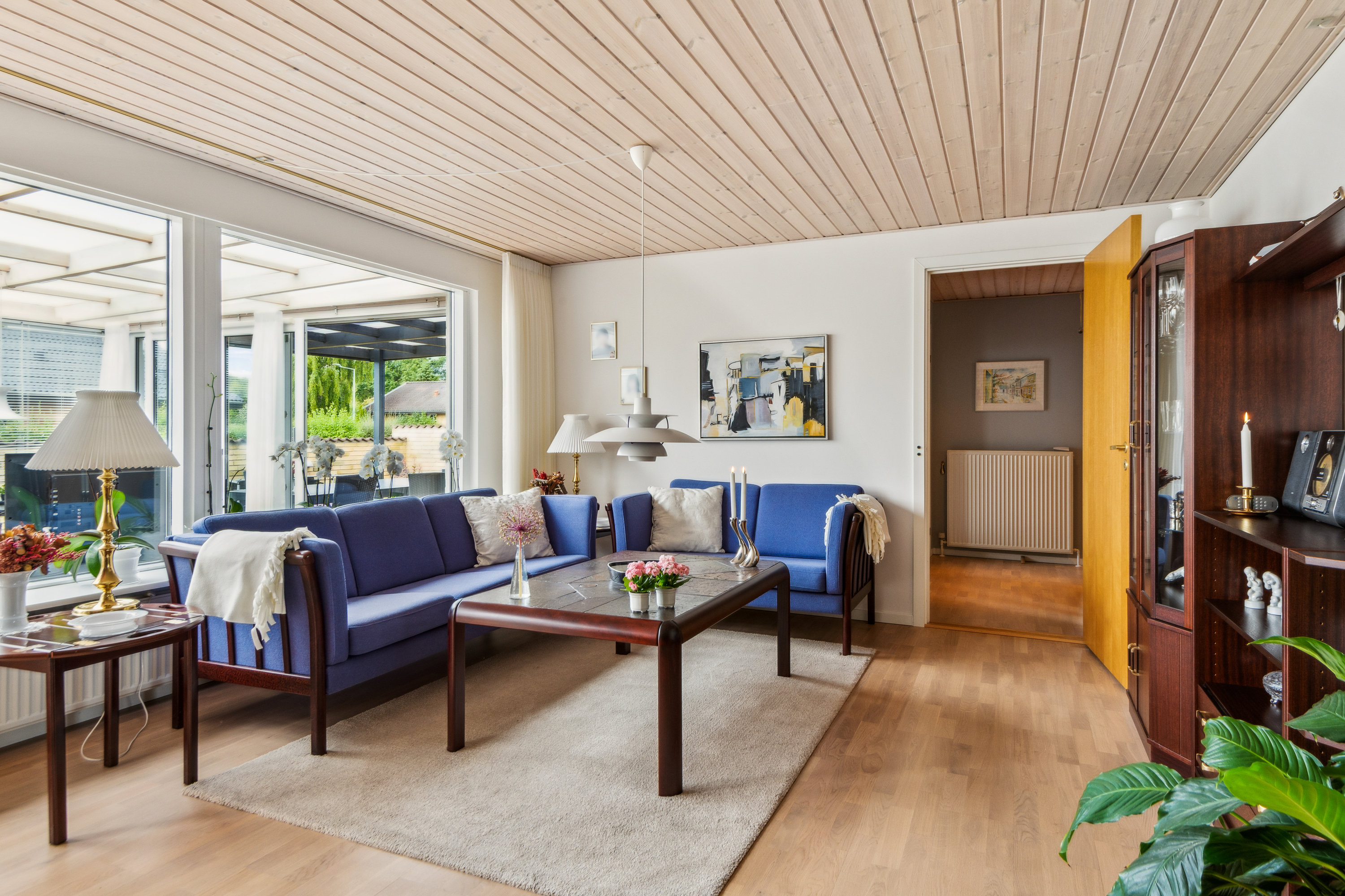 Fremhævet stue billede i fuldskærmstilstand. Billede af Rebildparken 25, 9220 Aalborg Øst