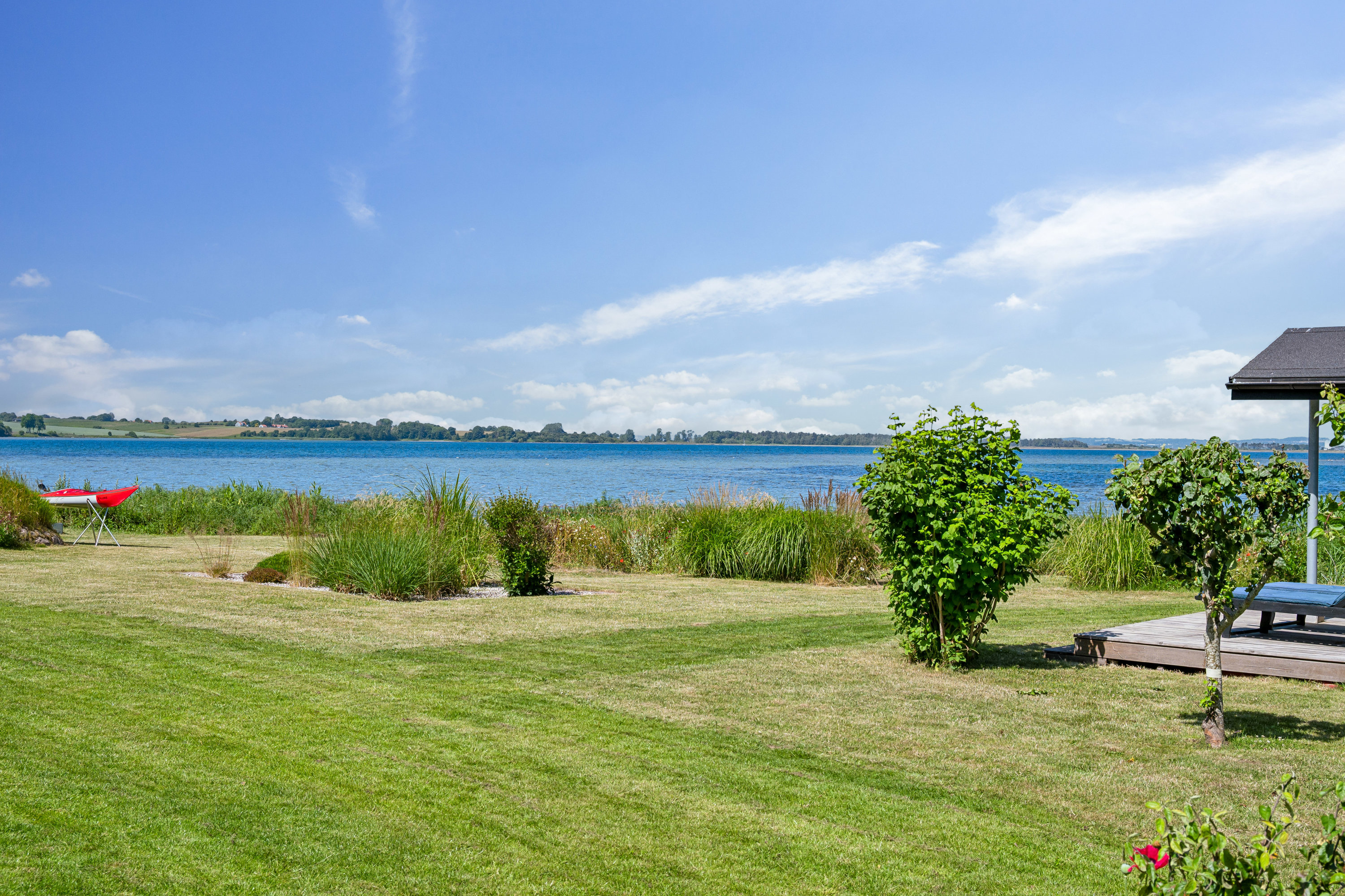 Fremhævet have billede i fuldskærmstilstand. Billede af Holmbjergvej 54, Knebelbro, 8420 Knebel