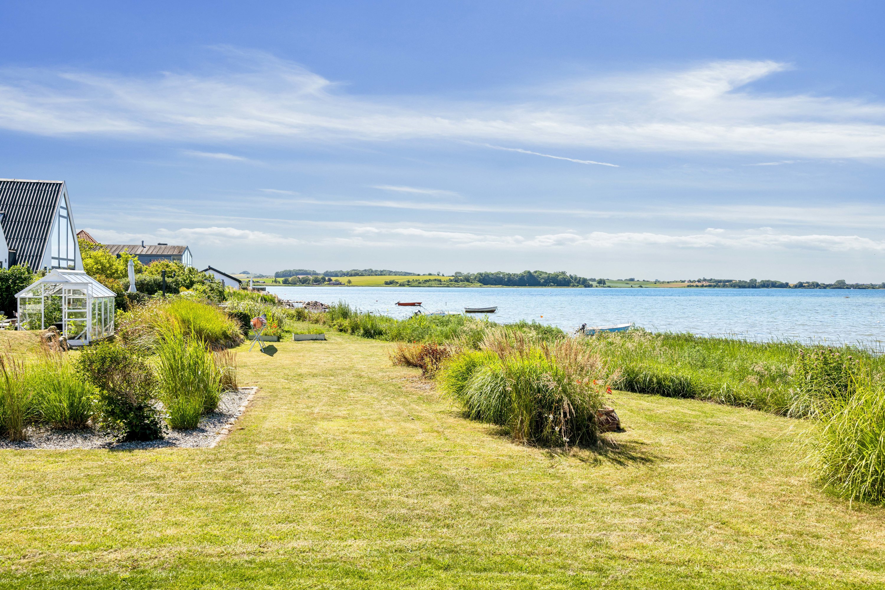 Fremhævet have billede i fuldskærmstilstand. Billede af Holmbjergvej 54, Knebelbro, 8420 Knebel