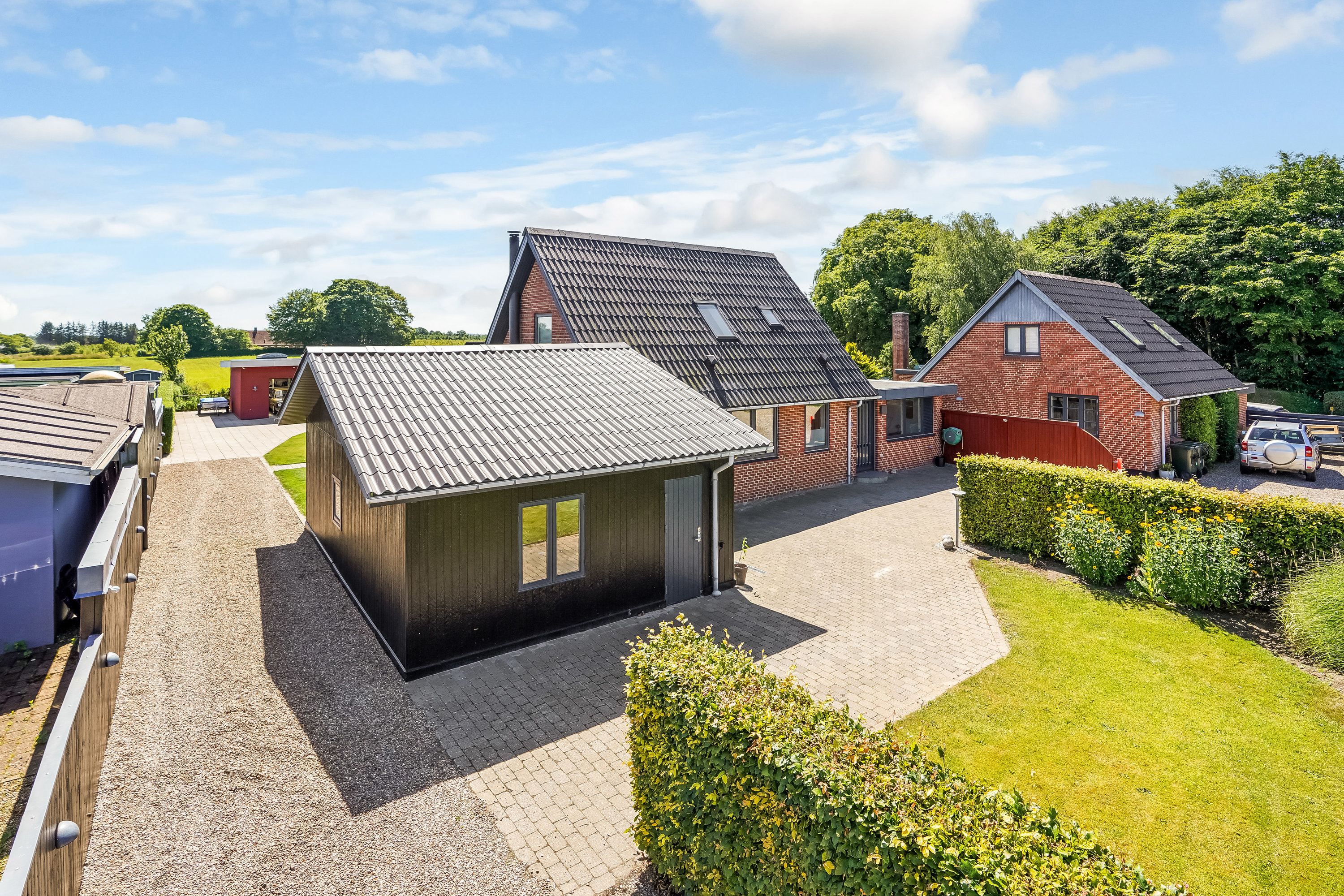 Fremhævet ejendommen billede i fuldskærmstilstand. Billede af Sydtoften 1, 7160 Tørring